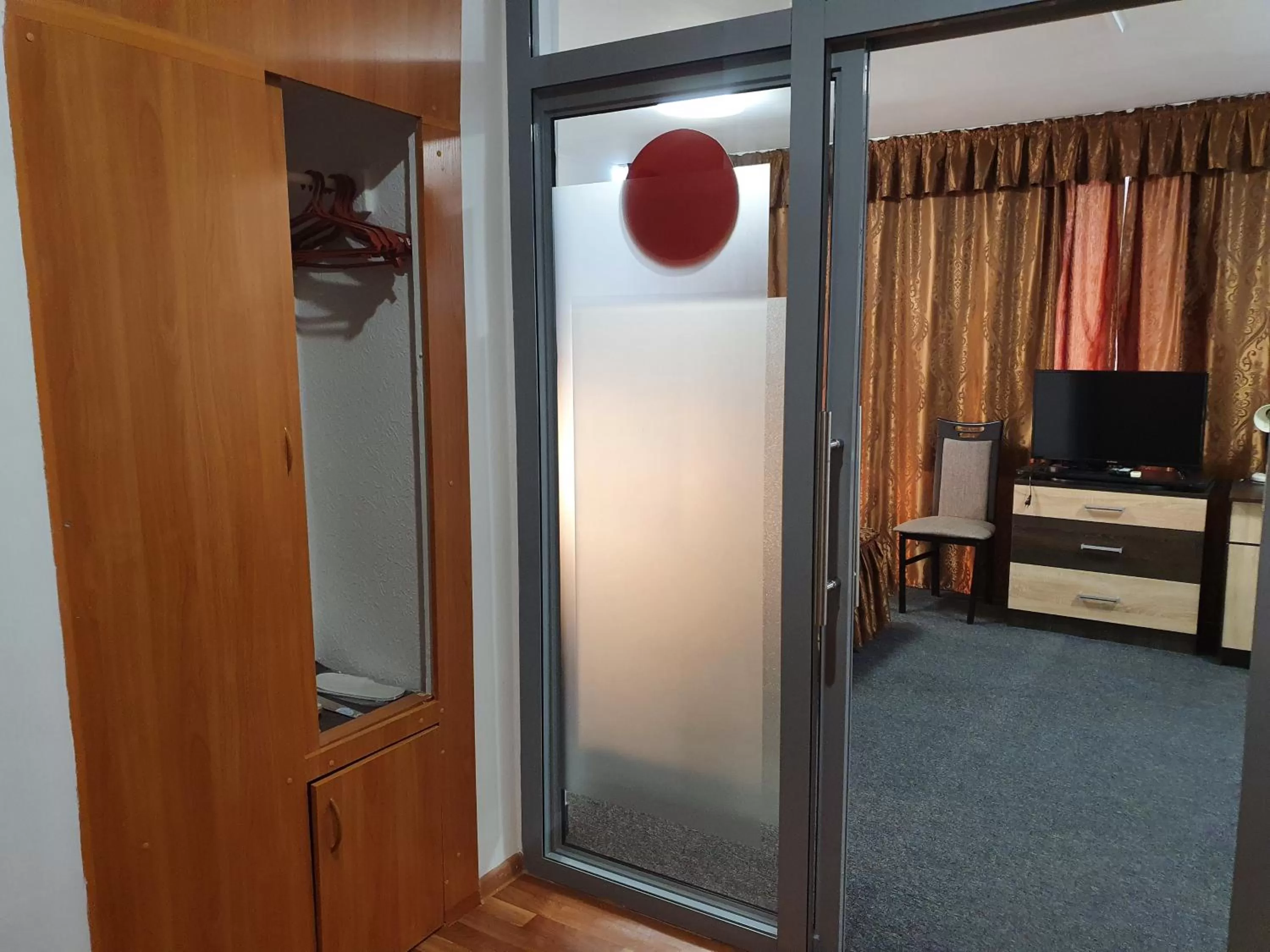 wardrobe, TV/Entertainment Center in Aktobe Hotel