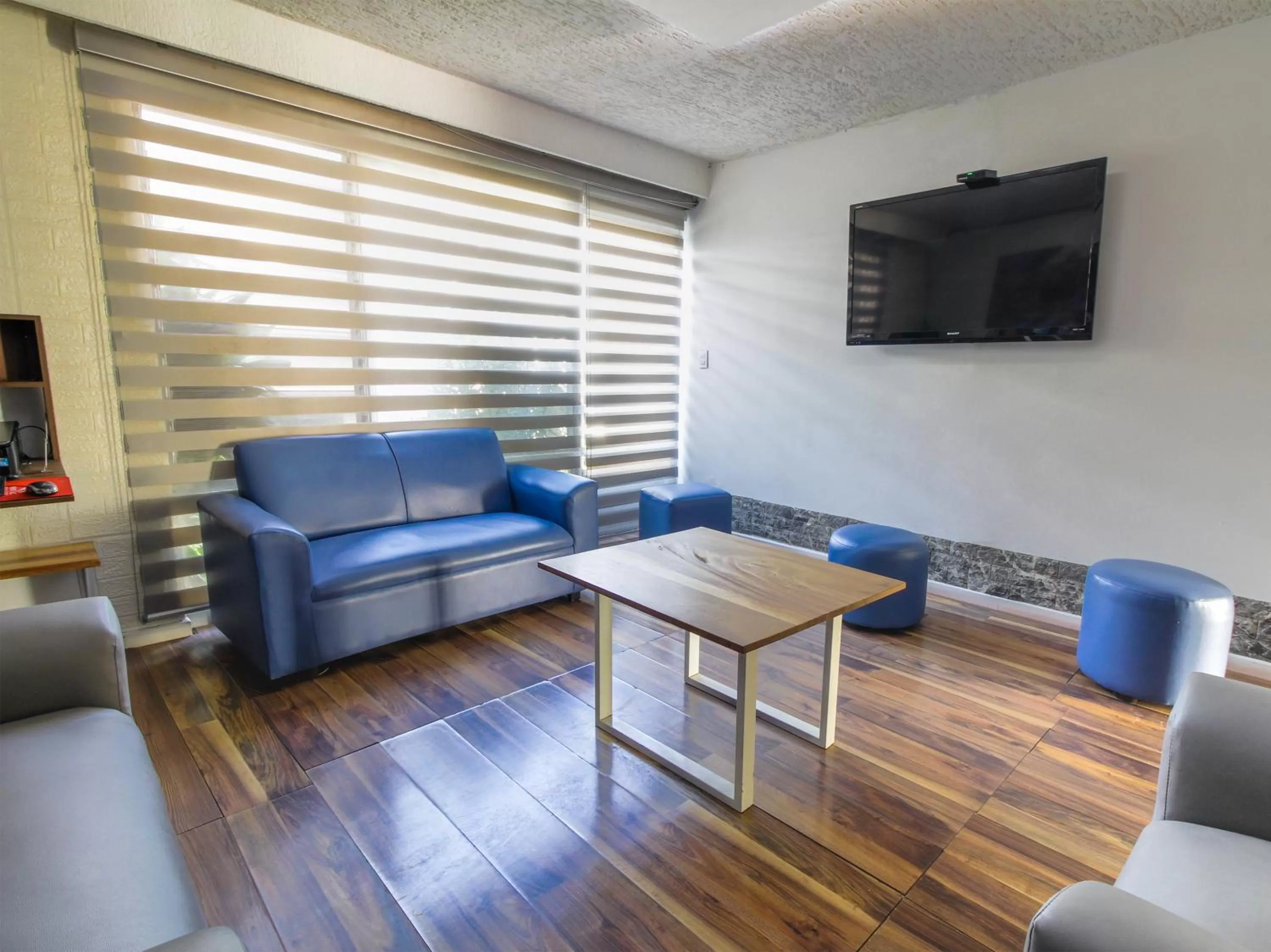 Lobby or reception, Seating Area in OYO Hotel Will Capsule,Expo Guadalajara