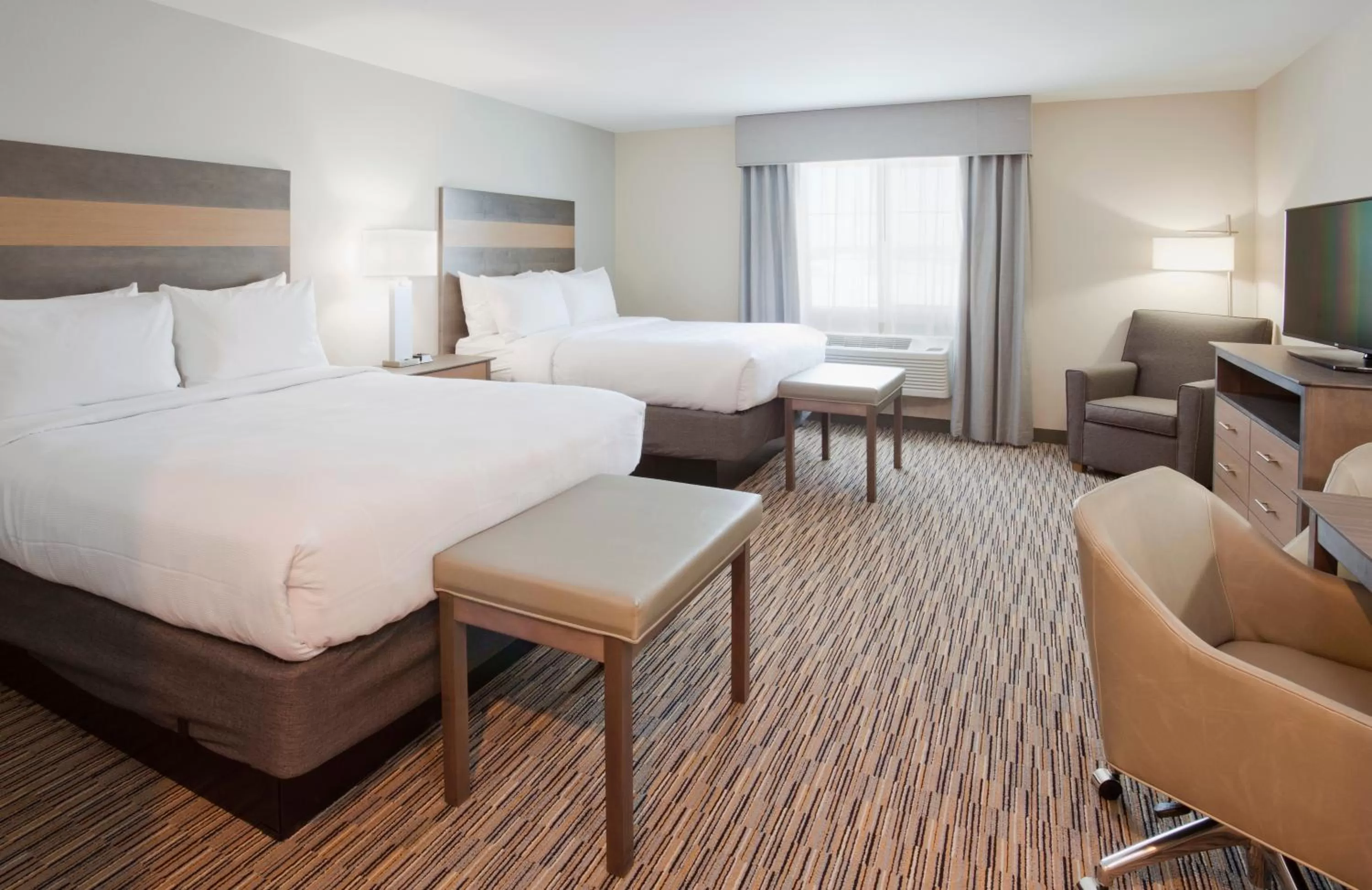 Photo of the whole room, Bed in GrandStay Hotel & Suites