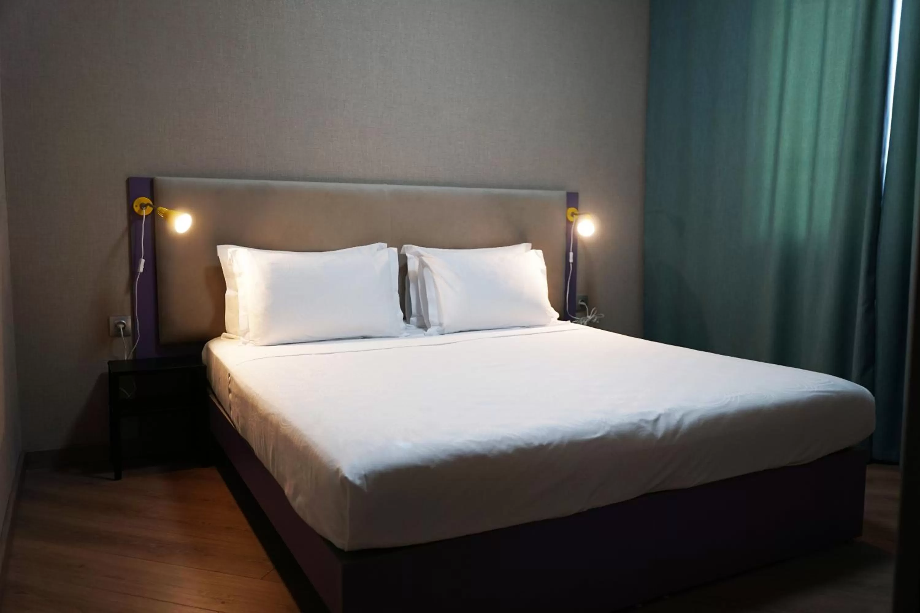 Bed in City Hotel Shymkent