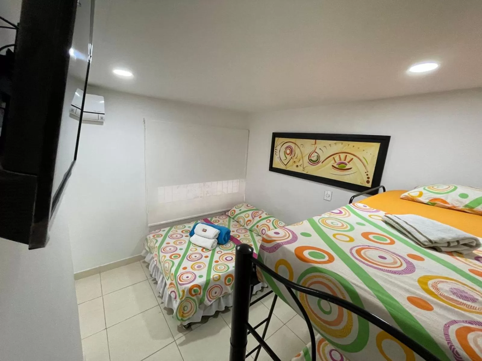 Photo of the whole room, Bed in Lindos apartaestudios y habitaciones en Ibague