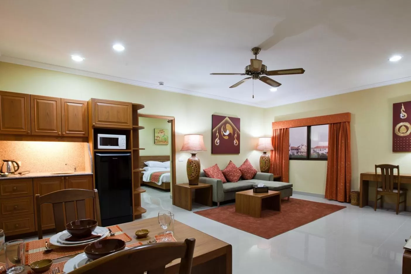 Kitchen or kitchenette, Bed in Baan Souy Resort