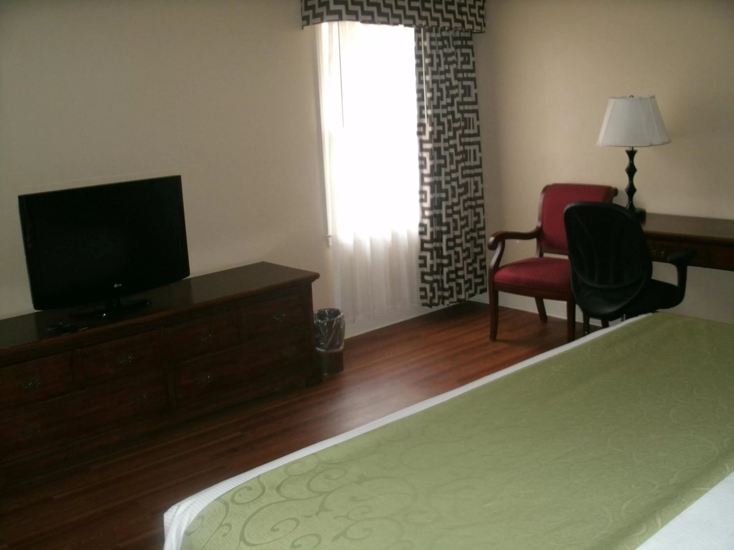 Bed in Merry Acres Inn