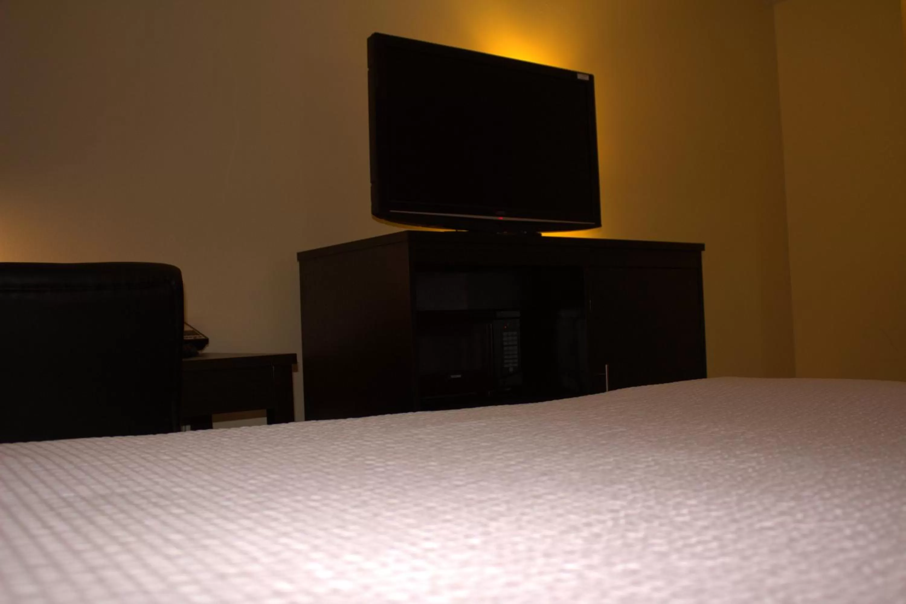 Bed in Super 8 by Wyndham Colby