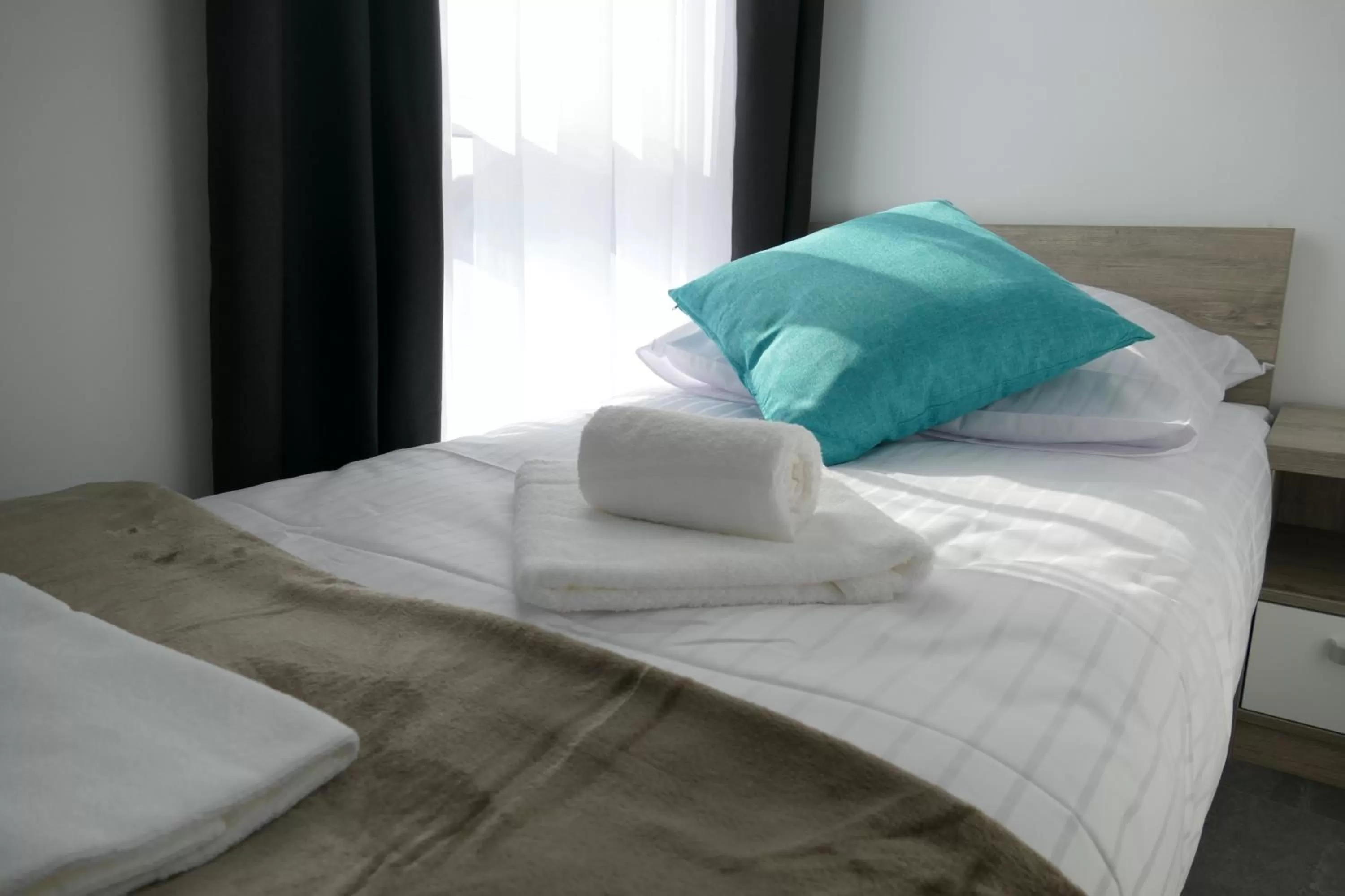 Bed in HP Apartments