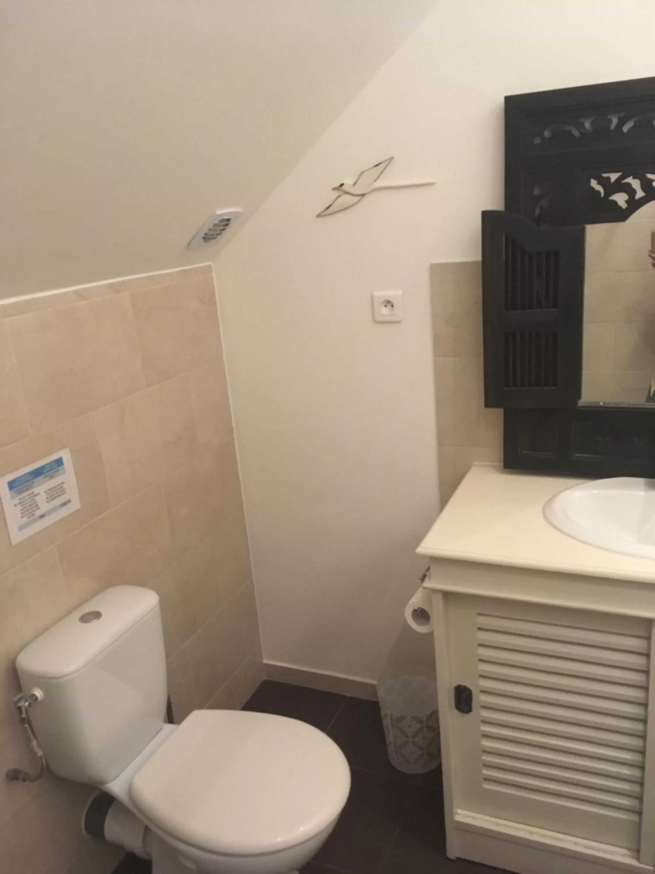 Toilet in Caloupilé