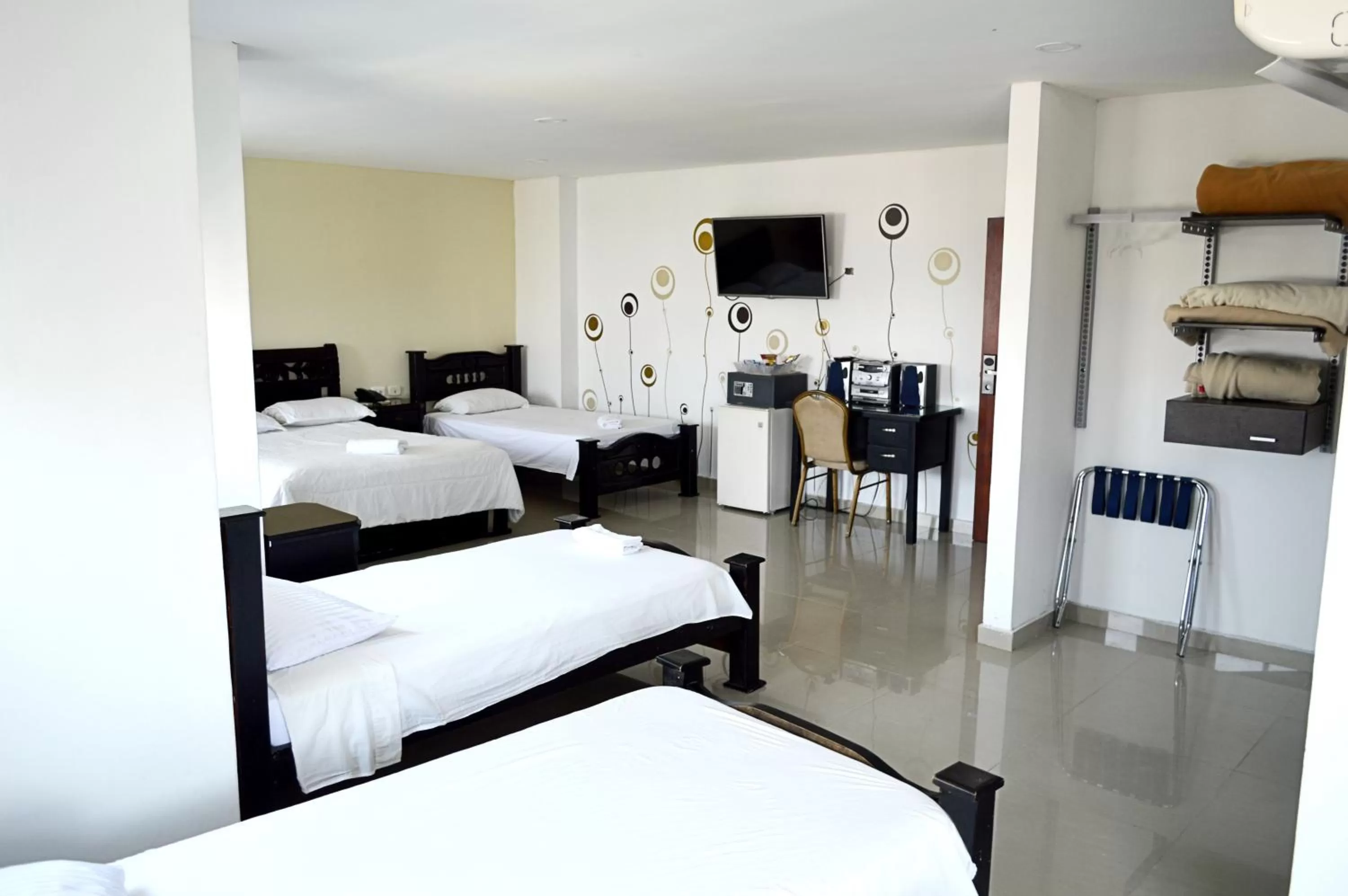 Bed in Hotel Intersuites