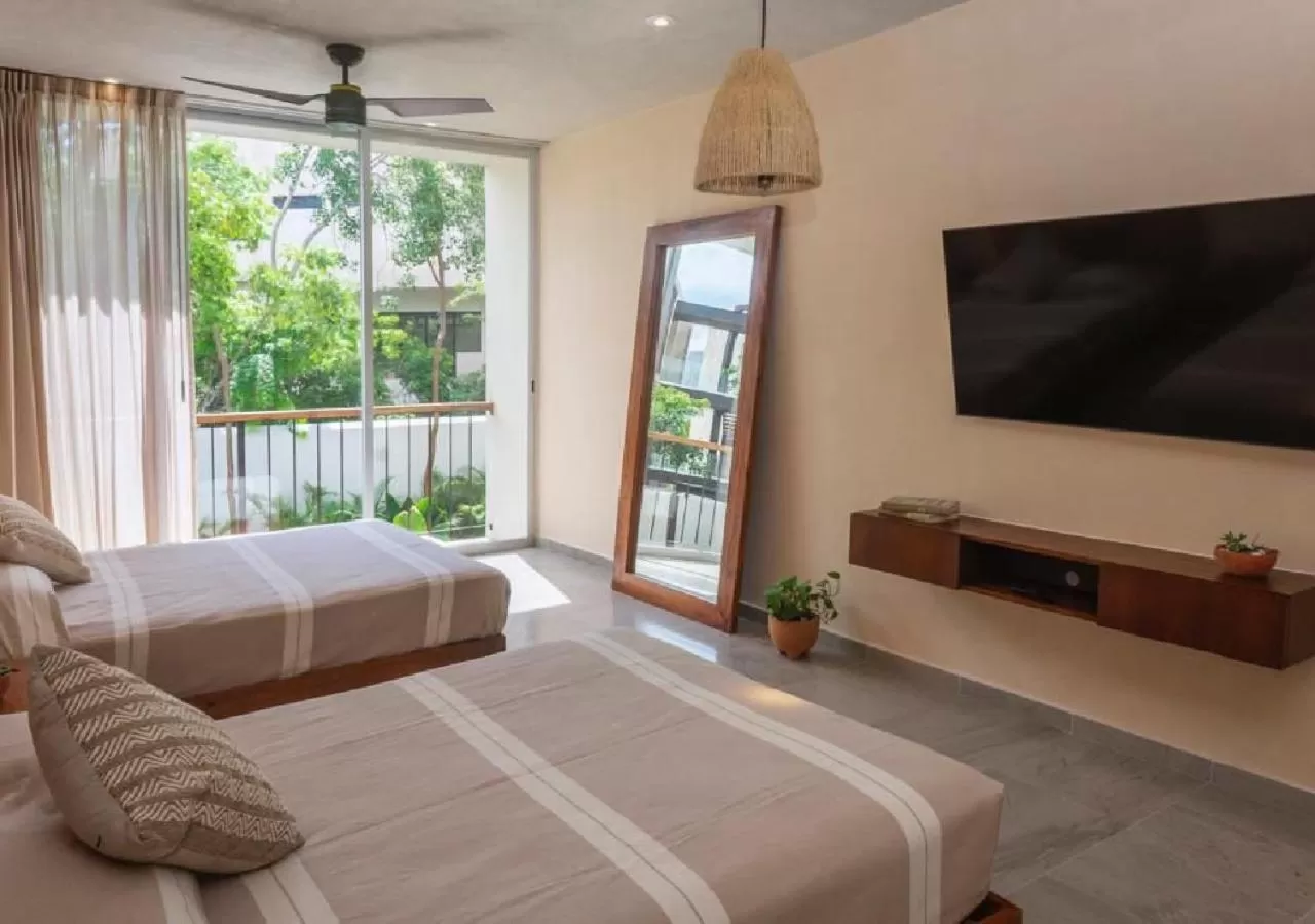 Bed in ARUNA TULUM-Luxury Studios & Apartments