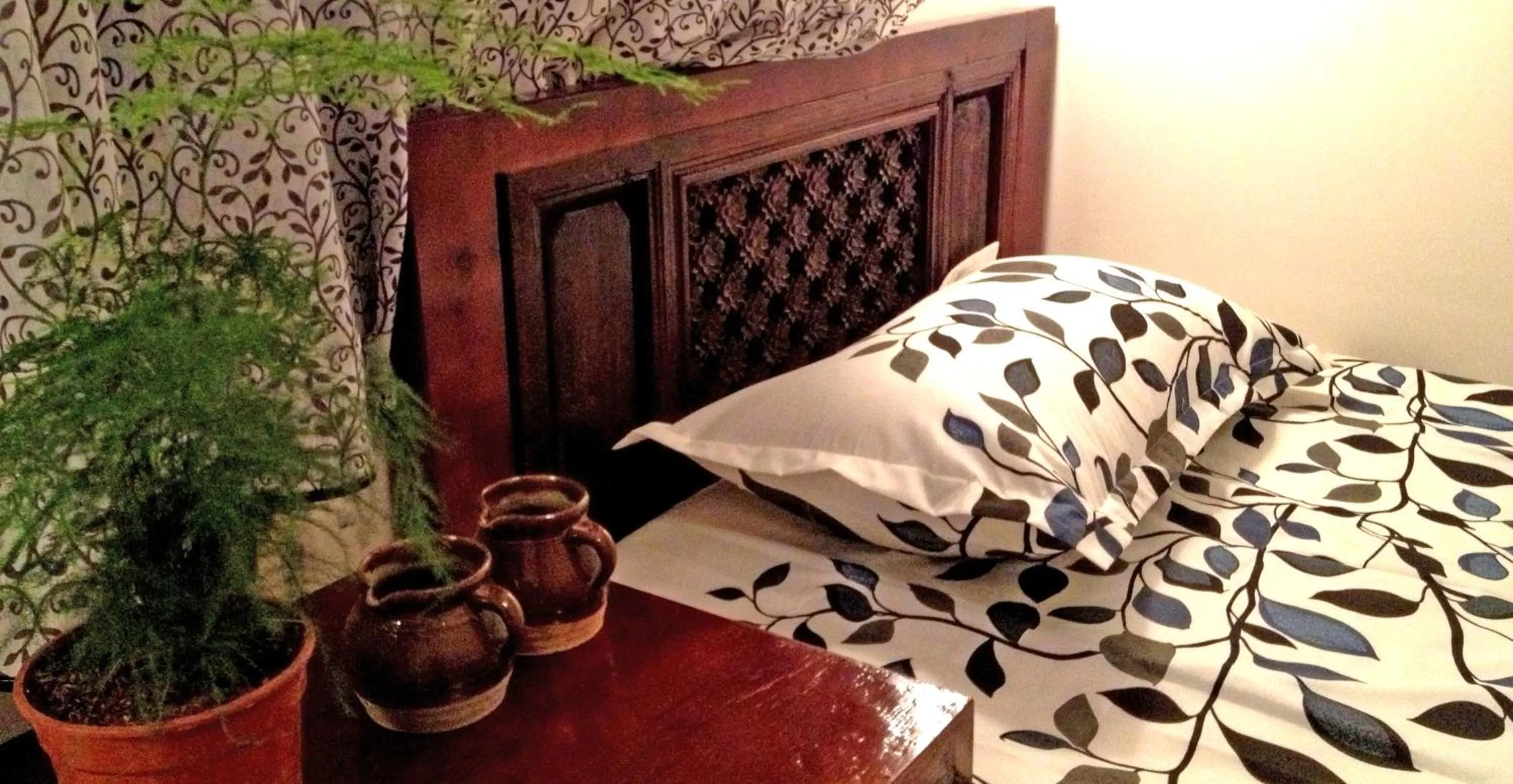 Bed in The Lily Pad Inn