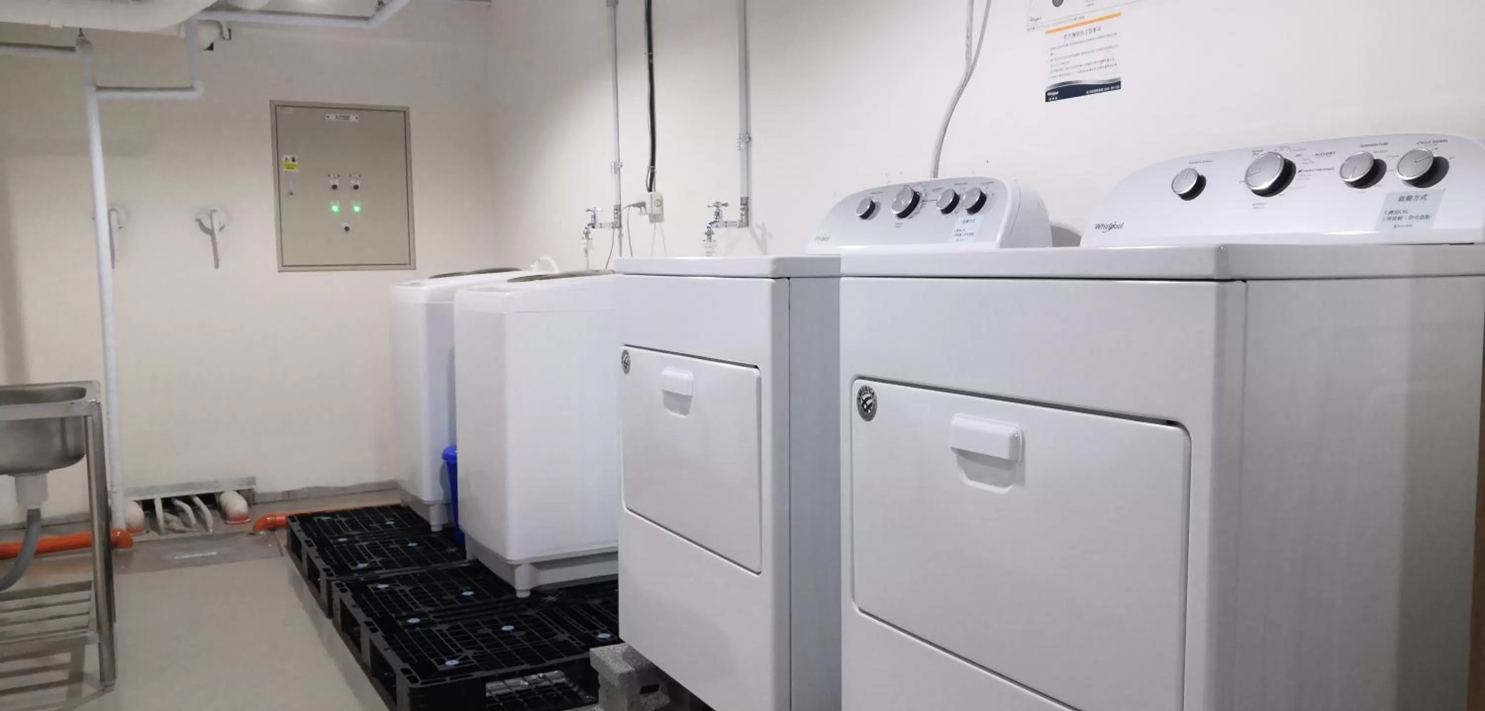 washing machine in Q21 Hotel