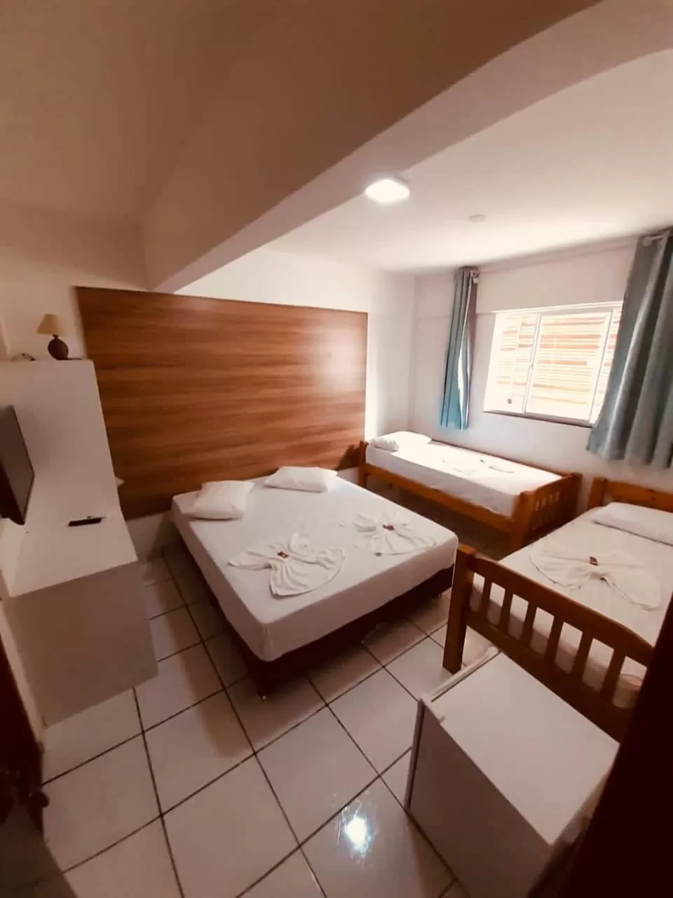 Bed in Flamingo Beach Pousada