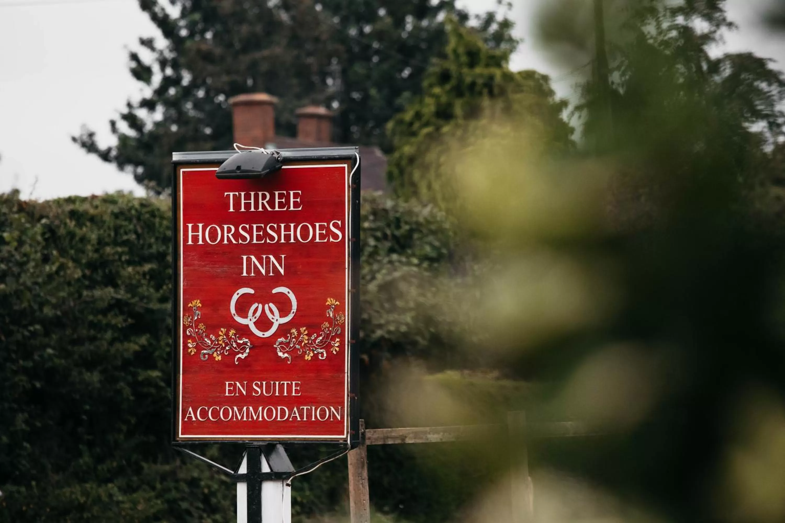 Property logo or sign in Three Horseshoes Inn