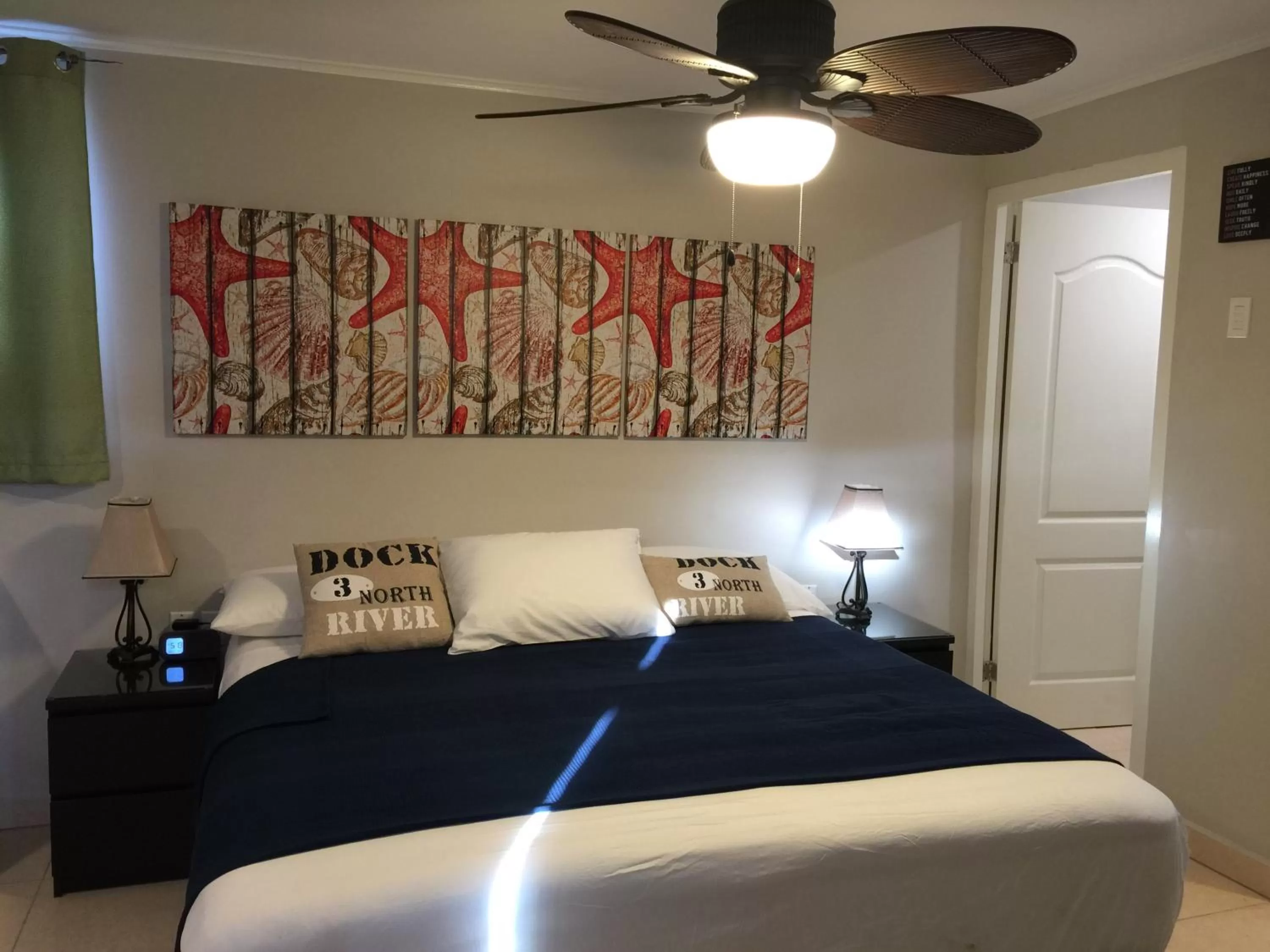 Bed in The Pier Beach Inn & Suites