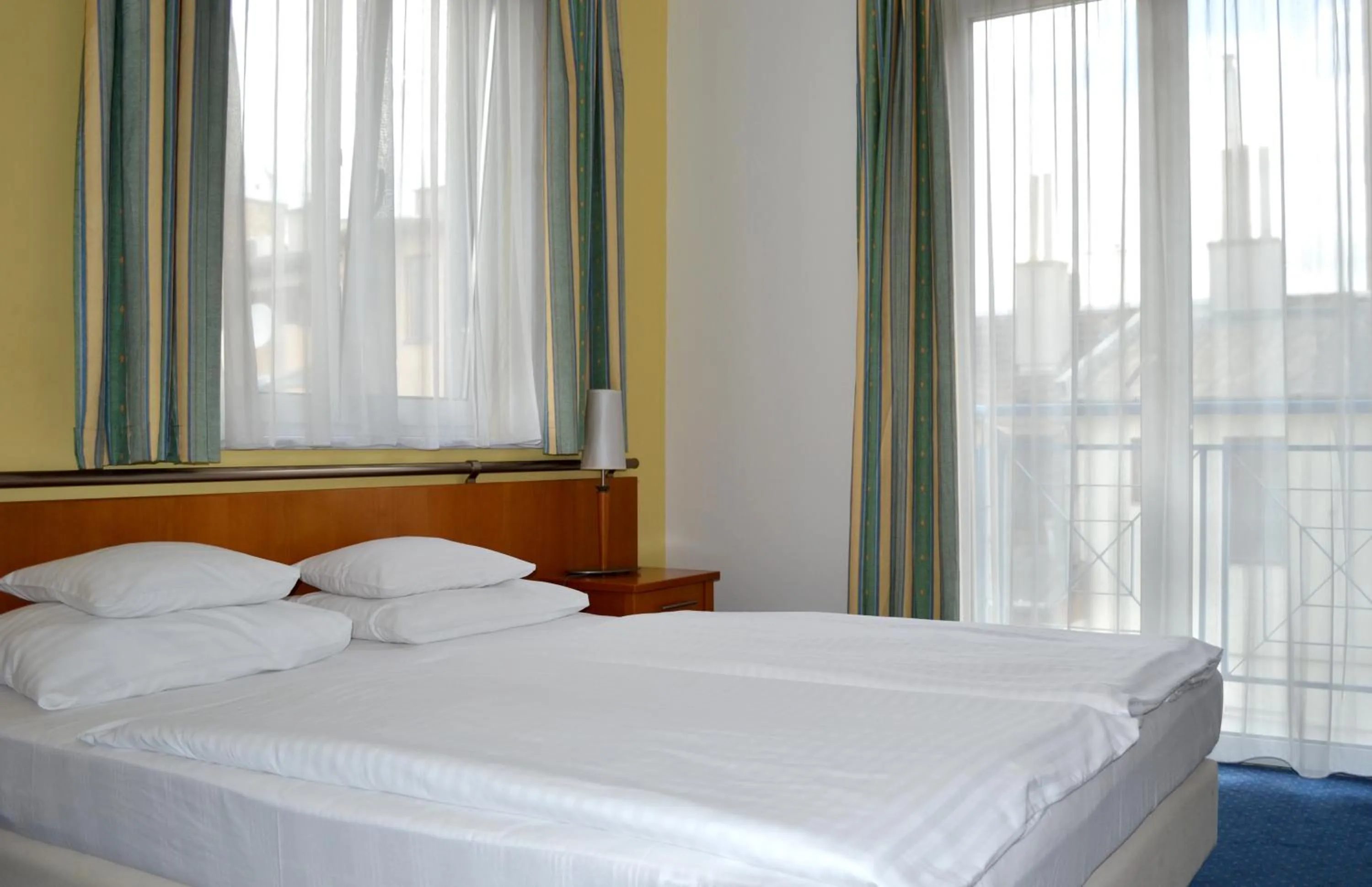 Bed in Hotel Veritas