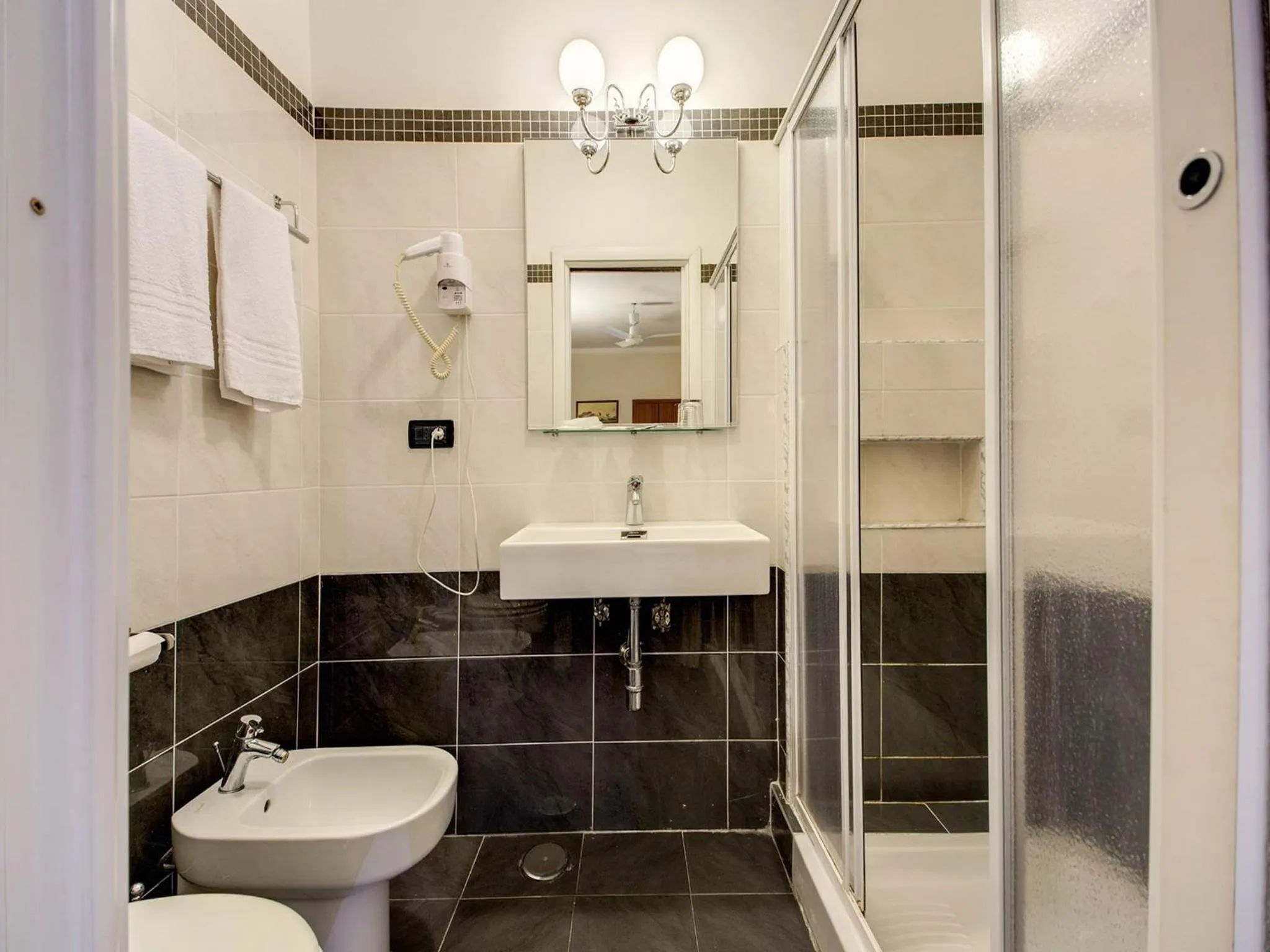 Bathroom in Hotel Giotto Flavia