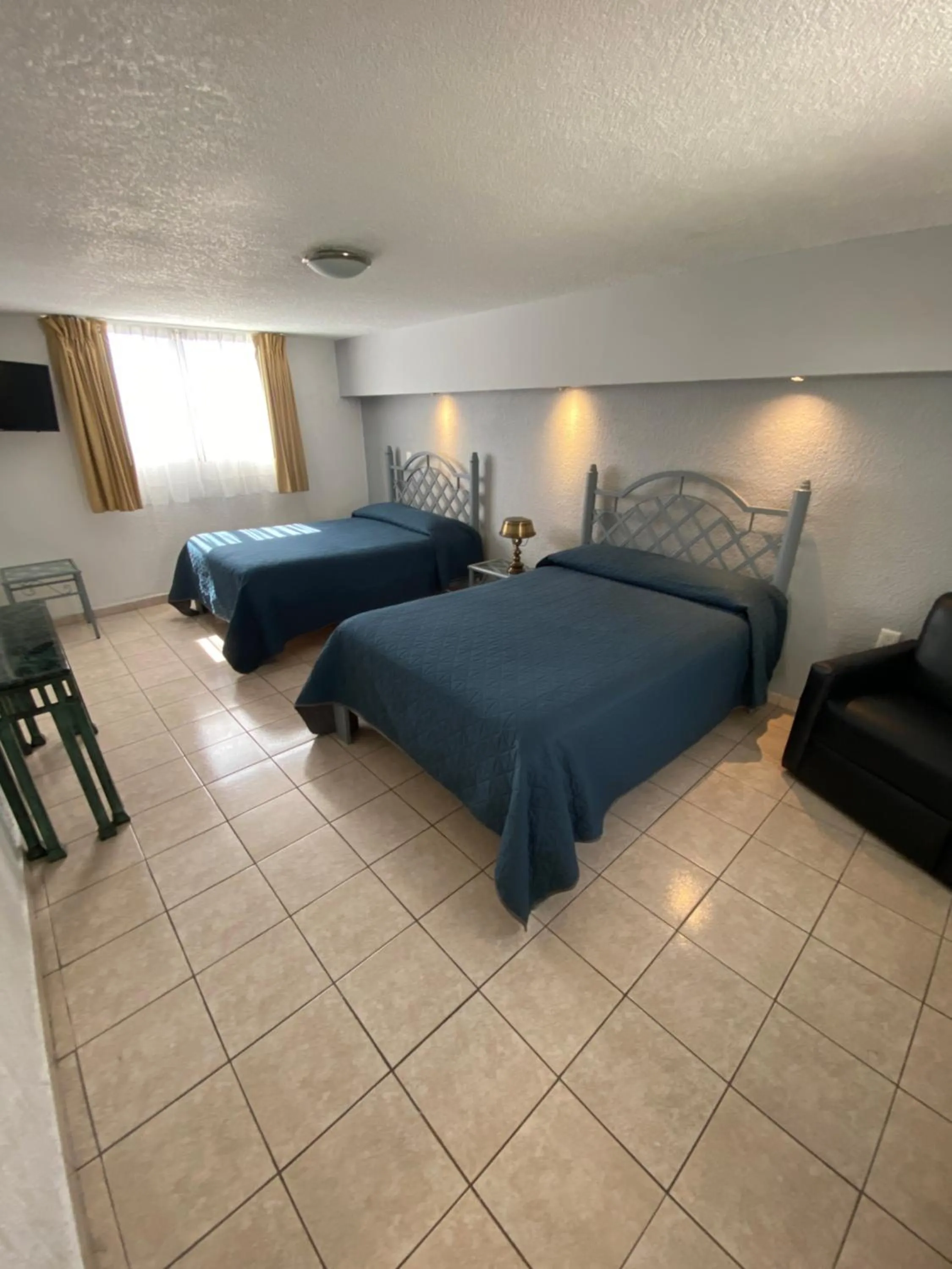 Bed in Hotel Qualitel Plus