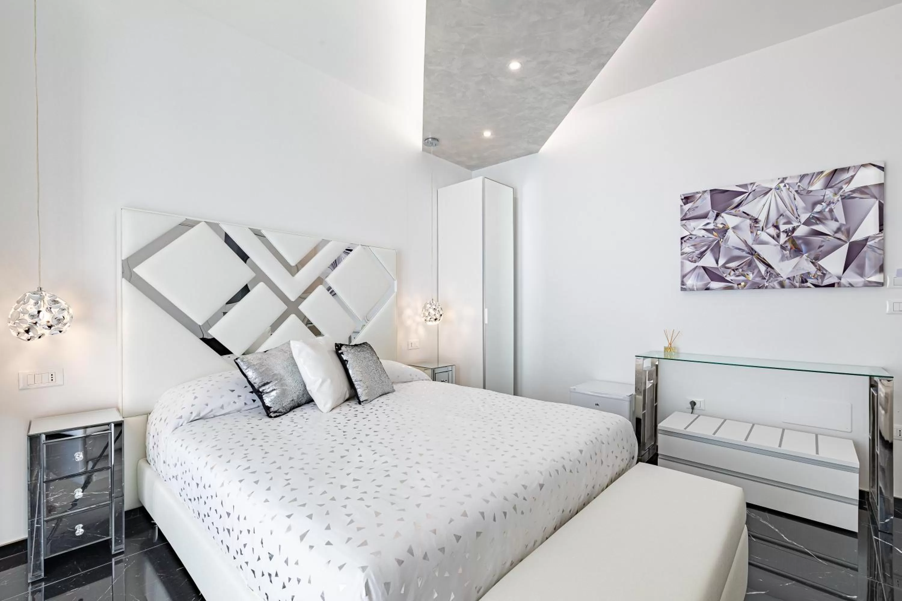 Bed in Prezioso suites & rooms