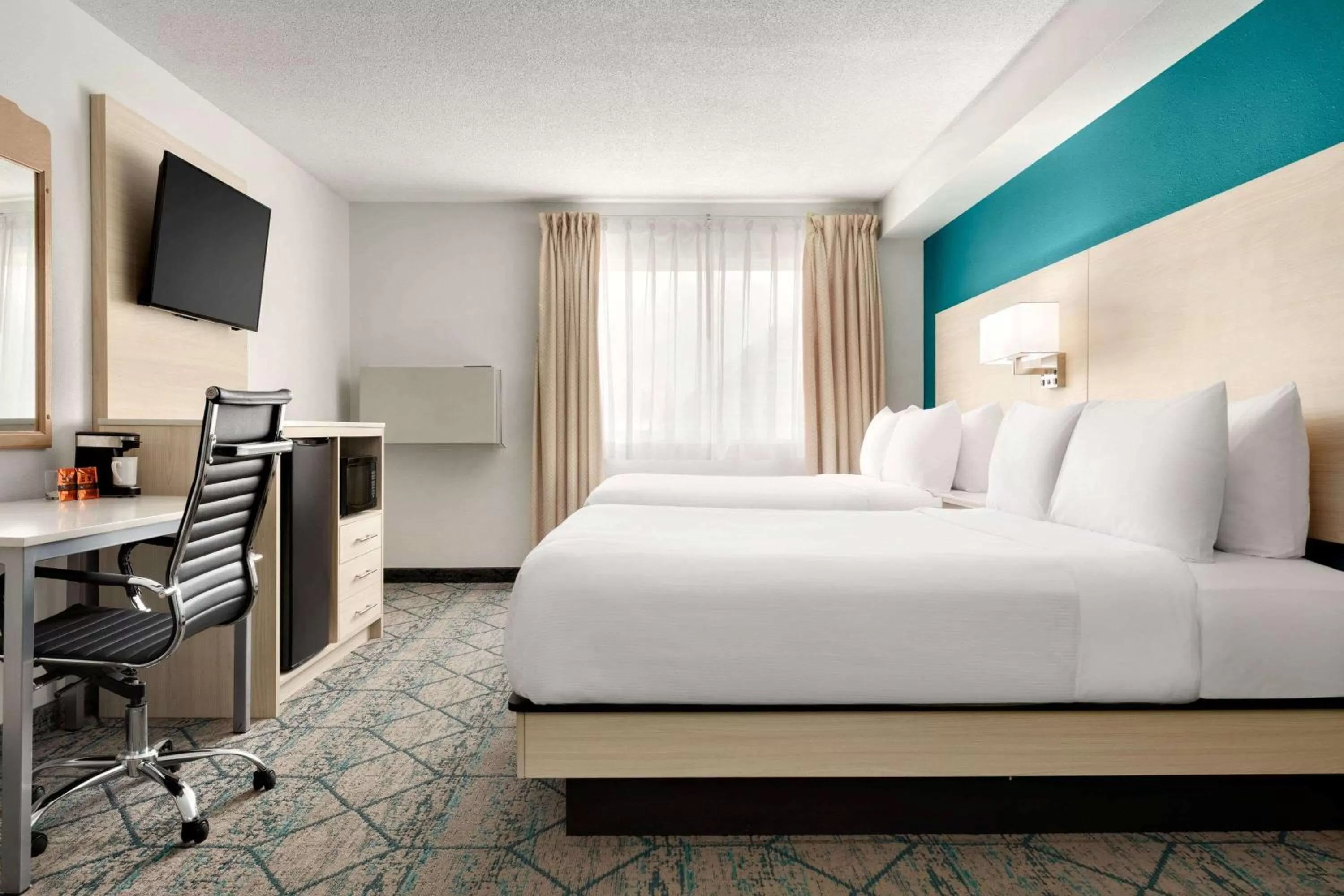Bedroom, Bed in Ramada by Wyndham Miramichi New Brunswick