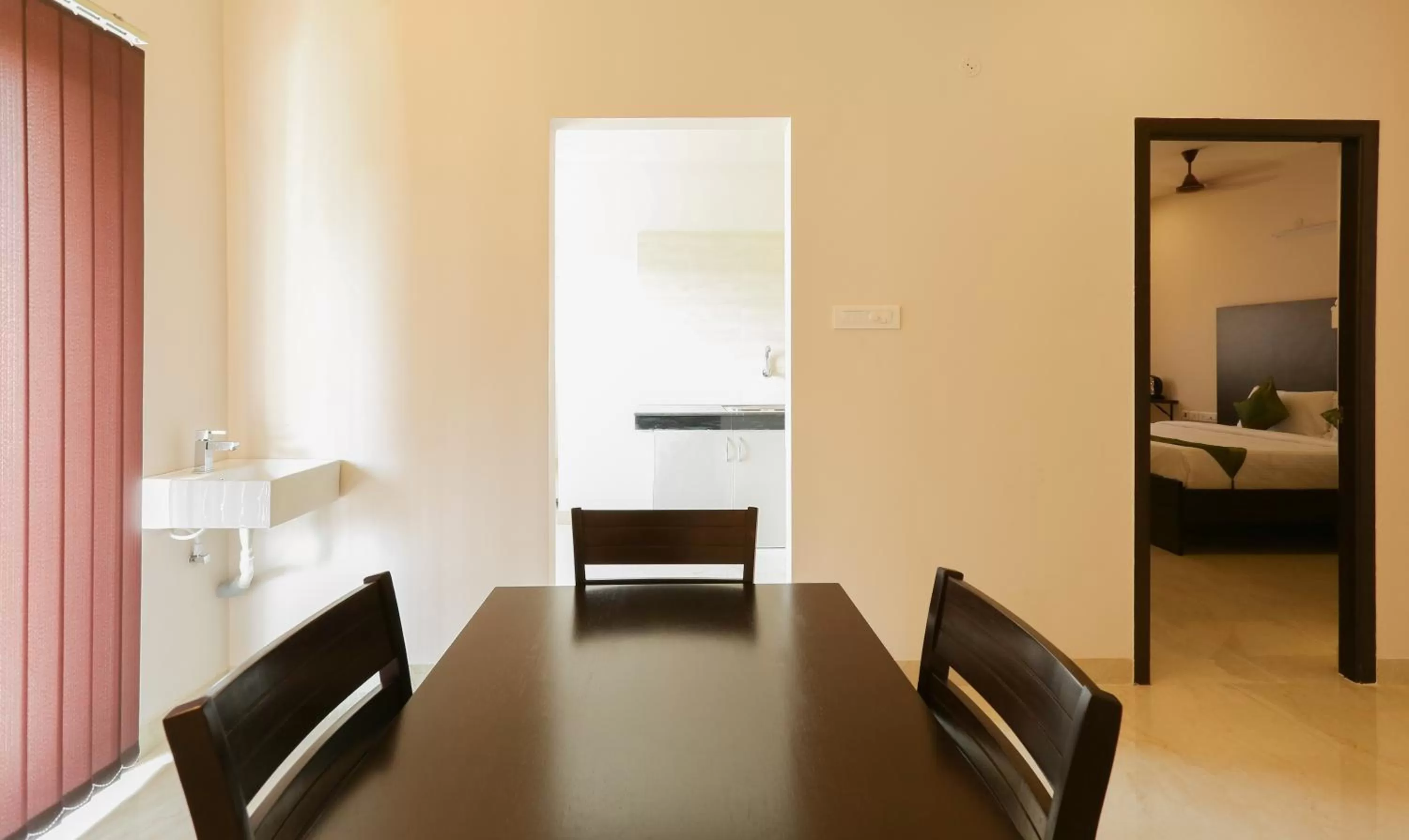 Dining area in Treebo Hi Line Apartments Kalapatti