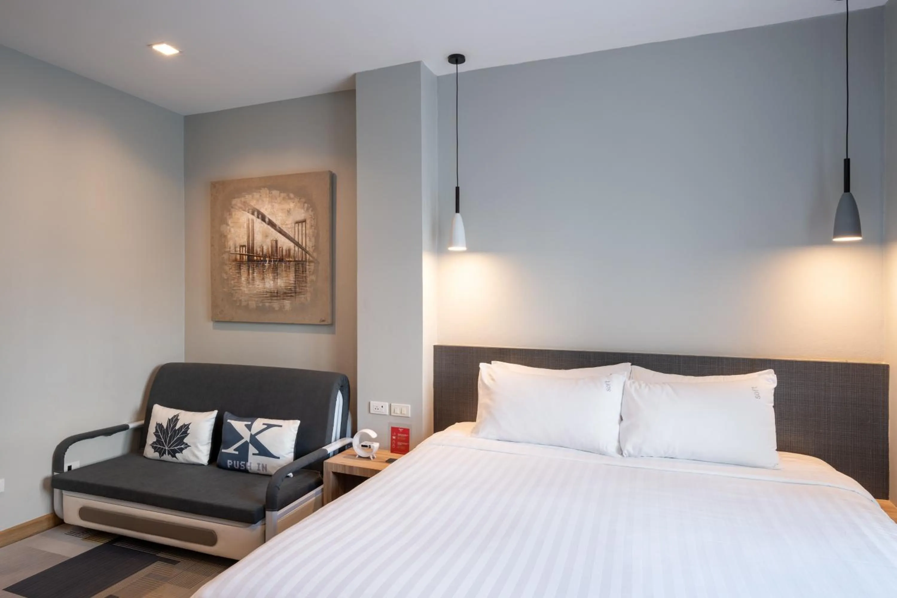 Seating area, Bed in iCheck inn Gems Center Silom