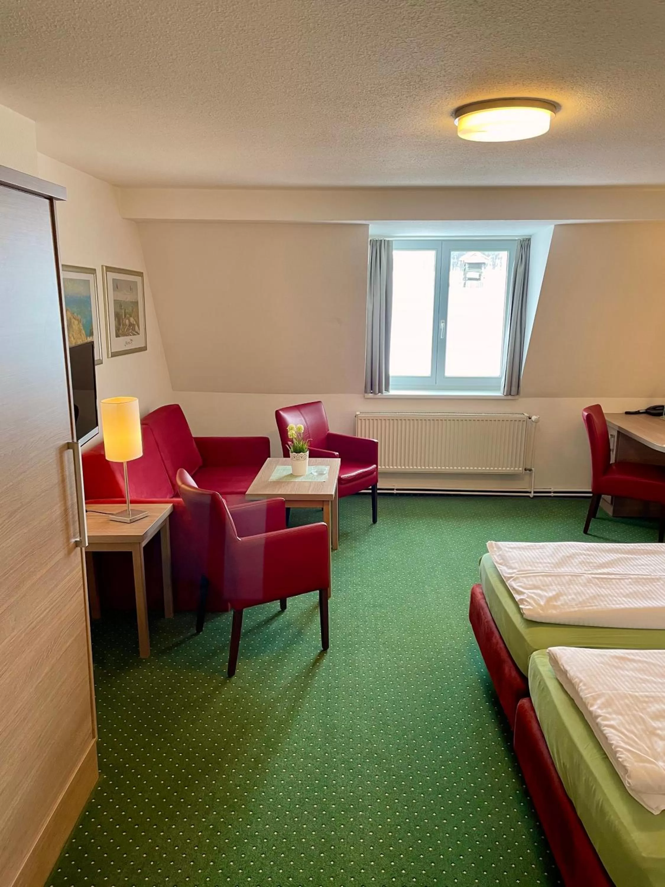 Seating area, Bed in Gasthof Scharfe Kurve