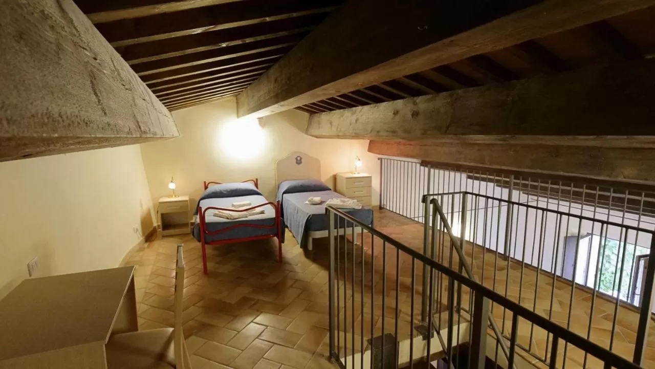Bed in Borgo de' Varano by Hotel I Duchi