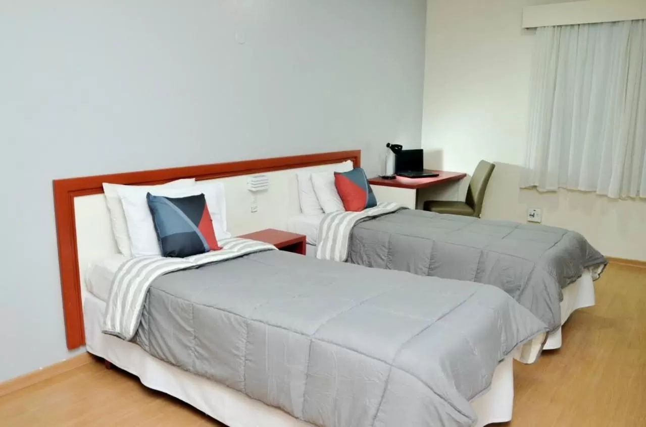 Photo of the whole room, Bed in Embaixador Hotel & Centro de Eventos by Fast10