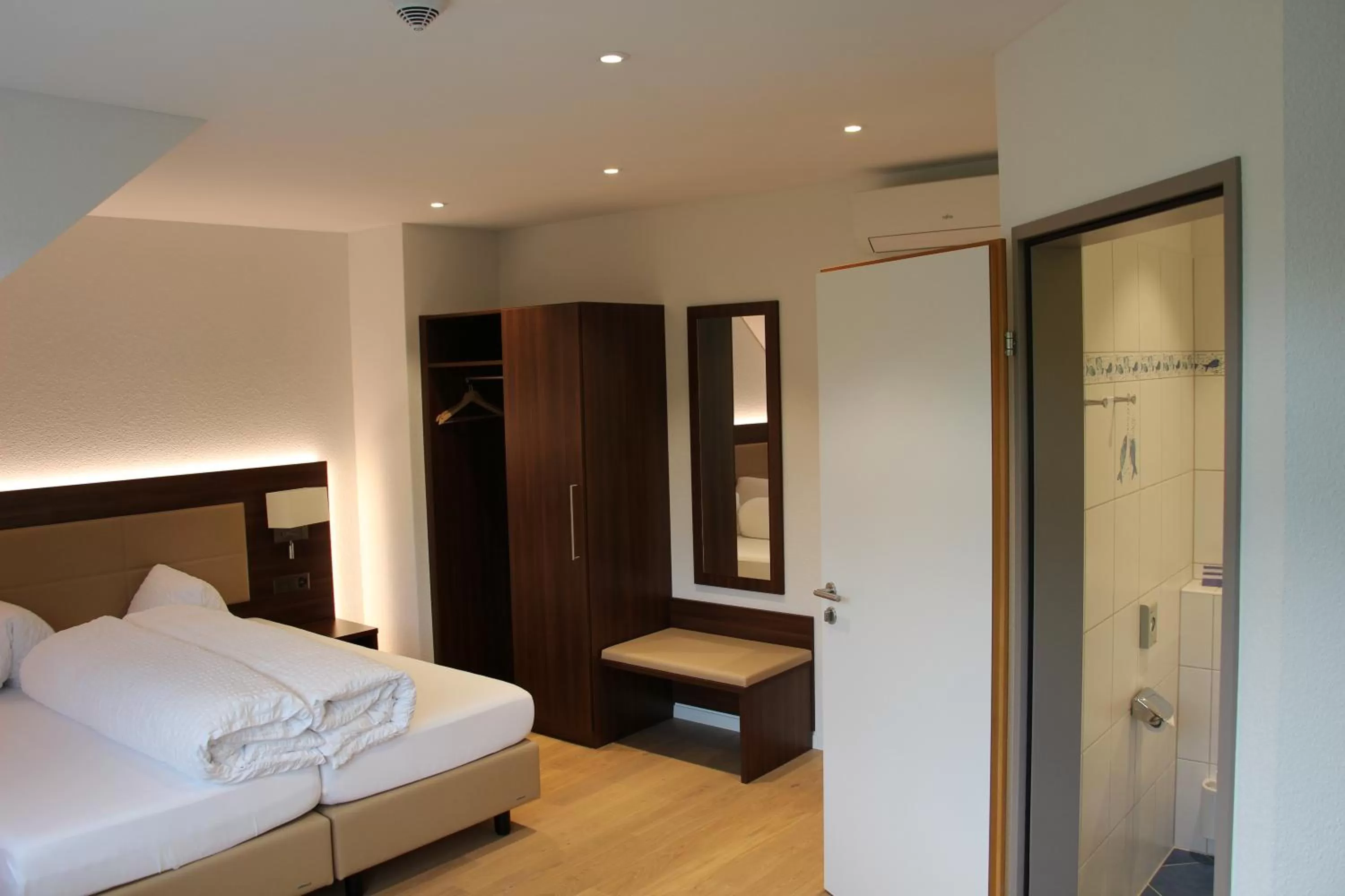 Photo of the whole room, Bed in Seehotel Delphin