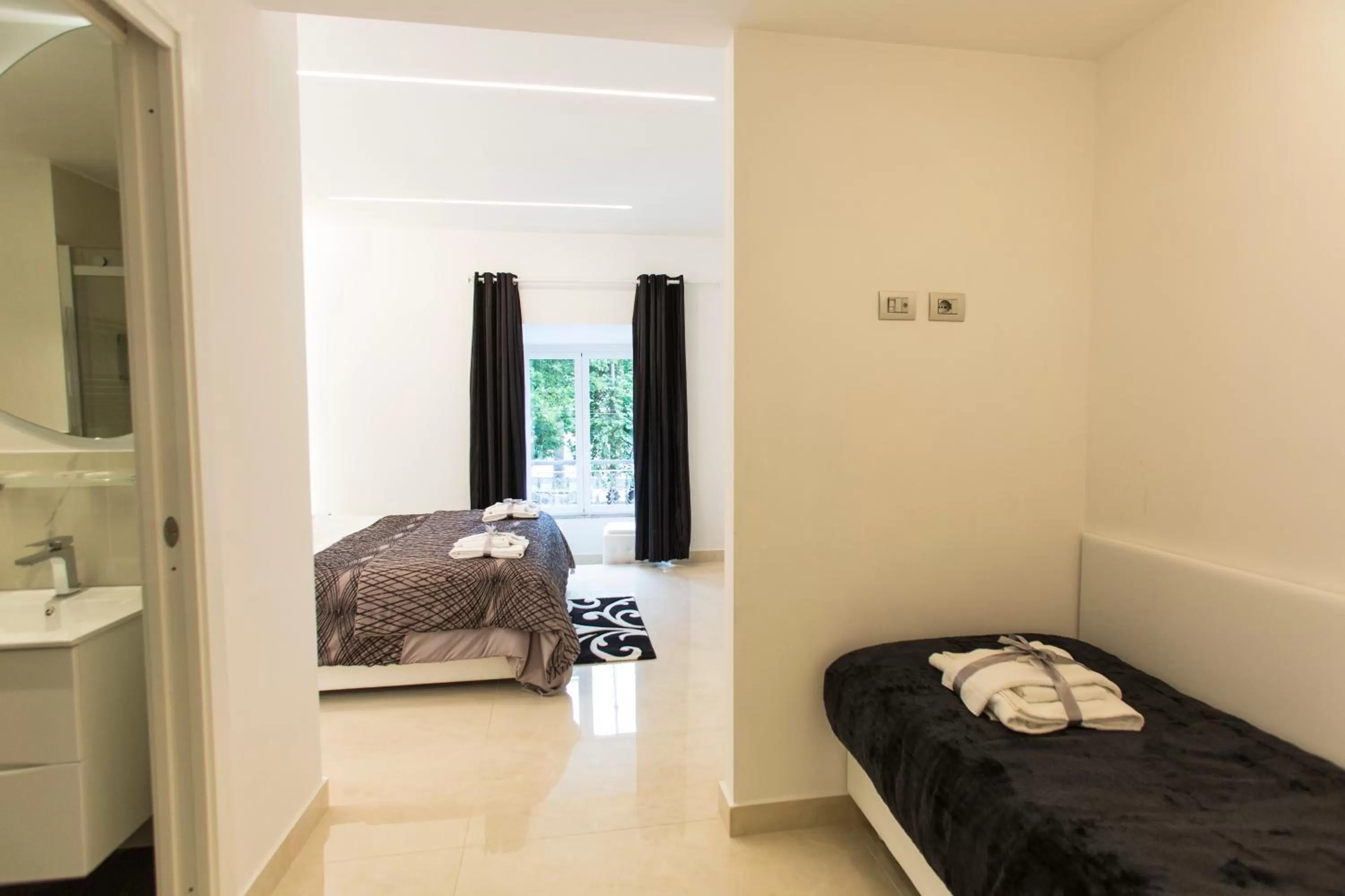 Bed in San Pietro Grand Suite