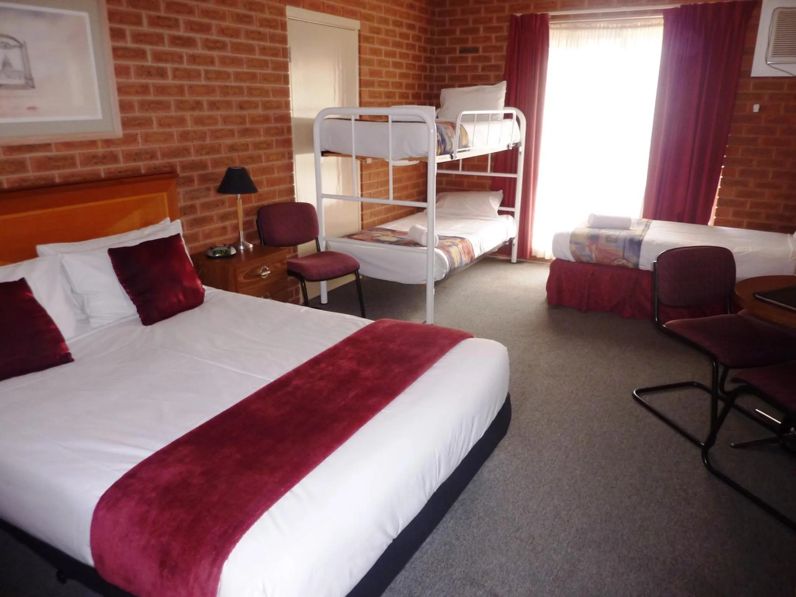 Bed in Central Yarrawonga Motor Inn