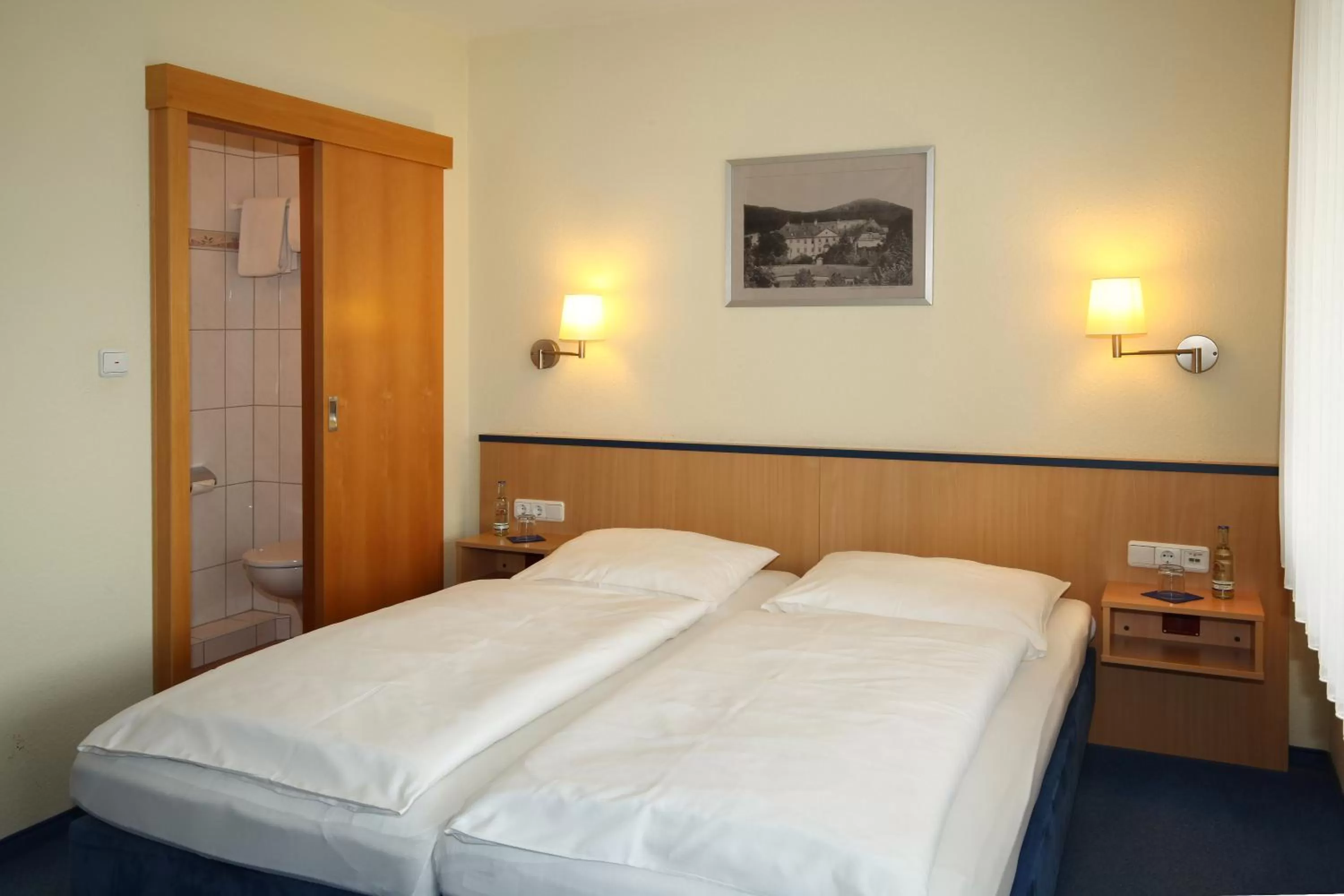Bed in Hotel garni Zum Drosten