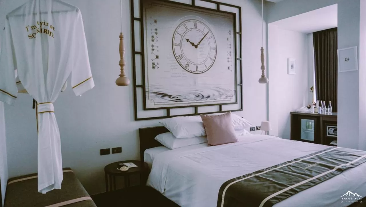 Bed in SOOKNIRUND HOTEL