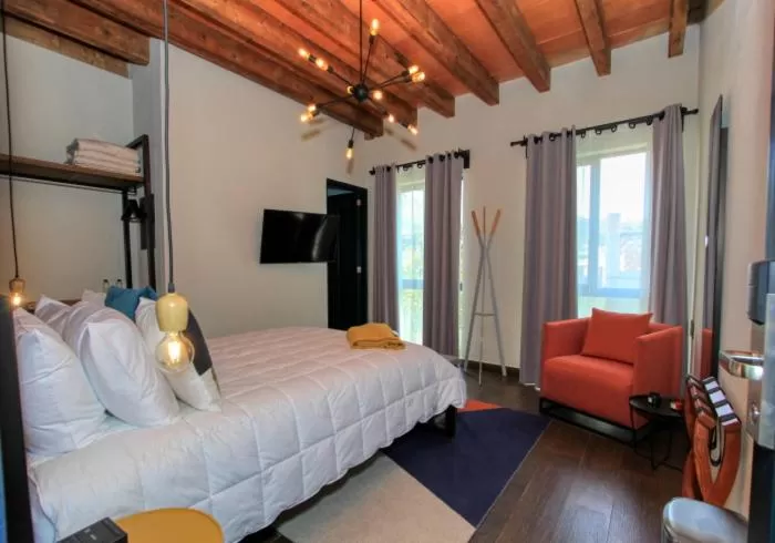 Bed in Antigua Trece Hotel Fusión & SPA