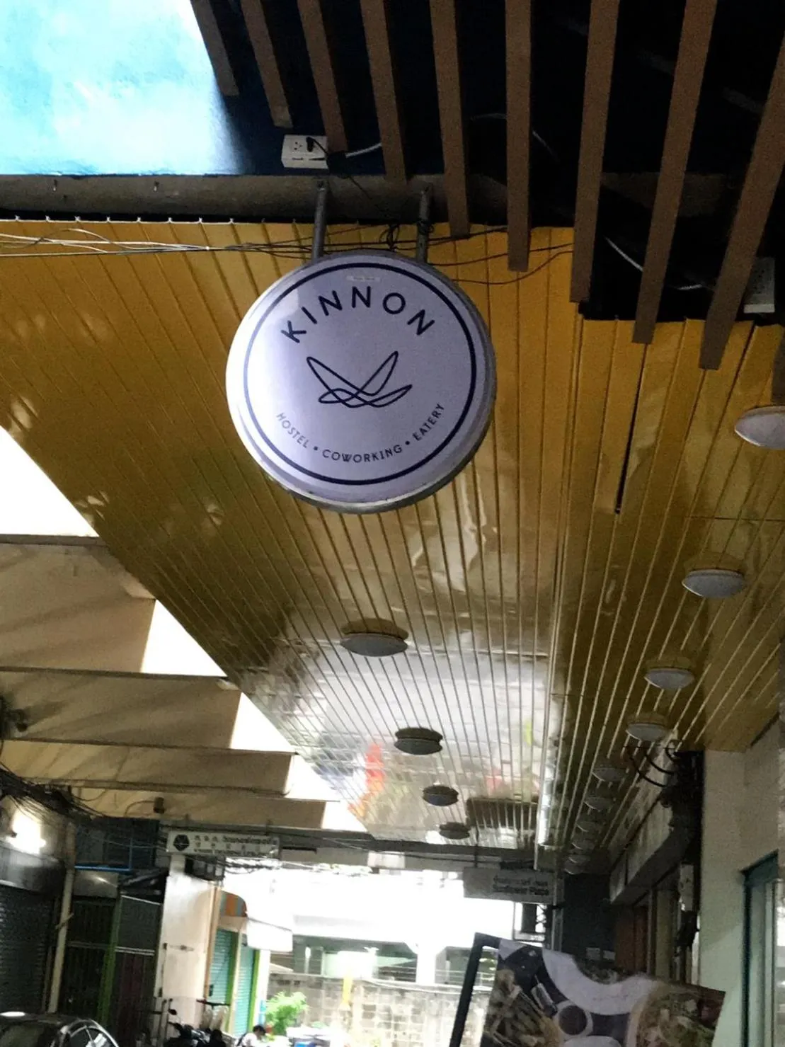 Property logo or sign in Kinnon Deluxe Hostel Coworking Cafe