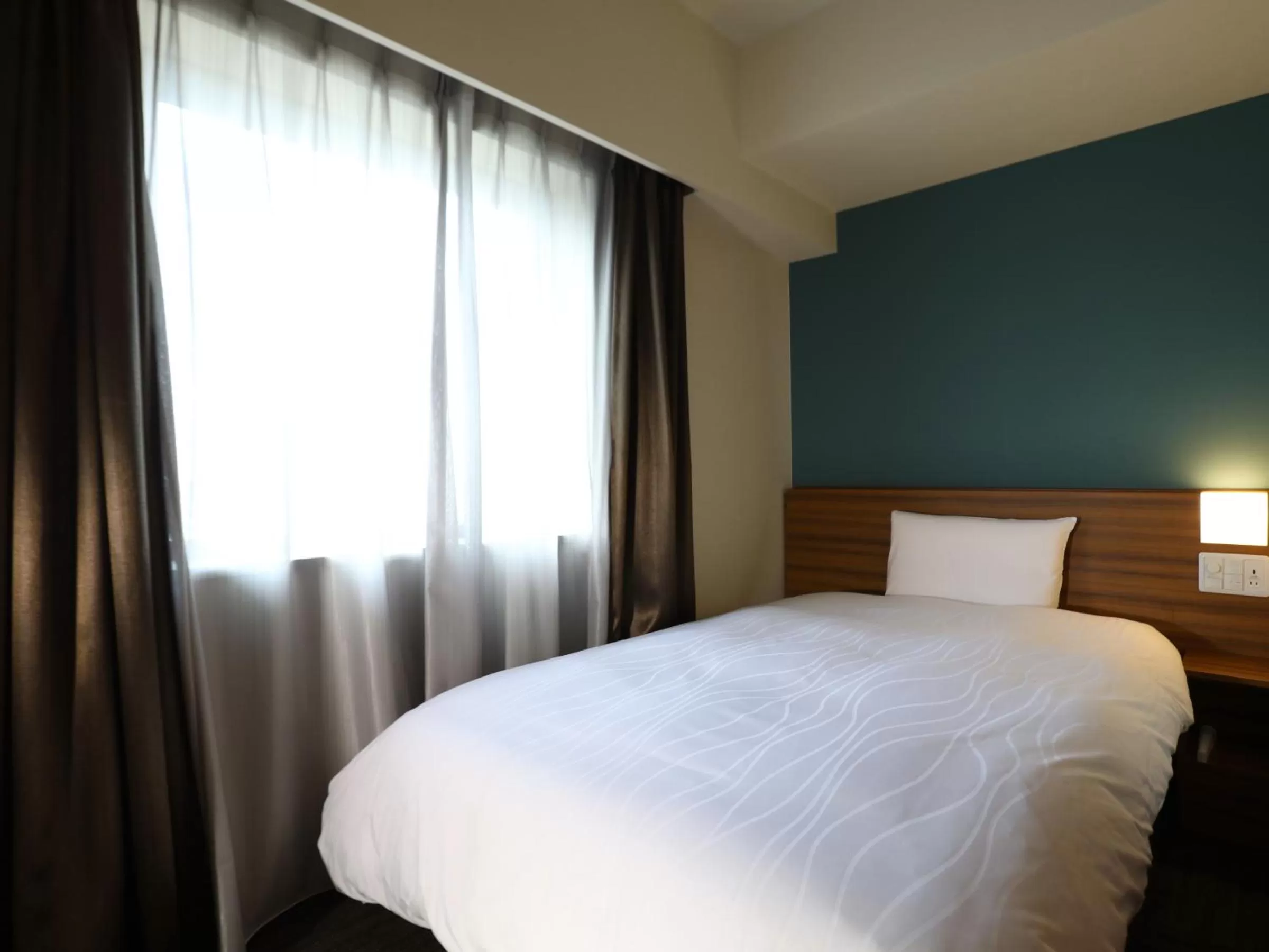 Bed in Dormy Inn Ikebukuro - Natural Hot Spring