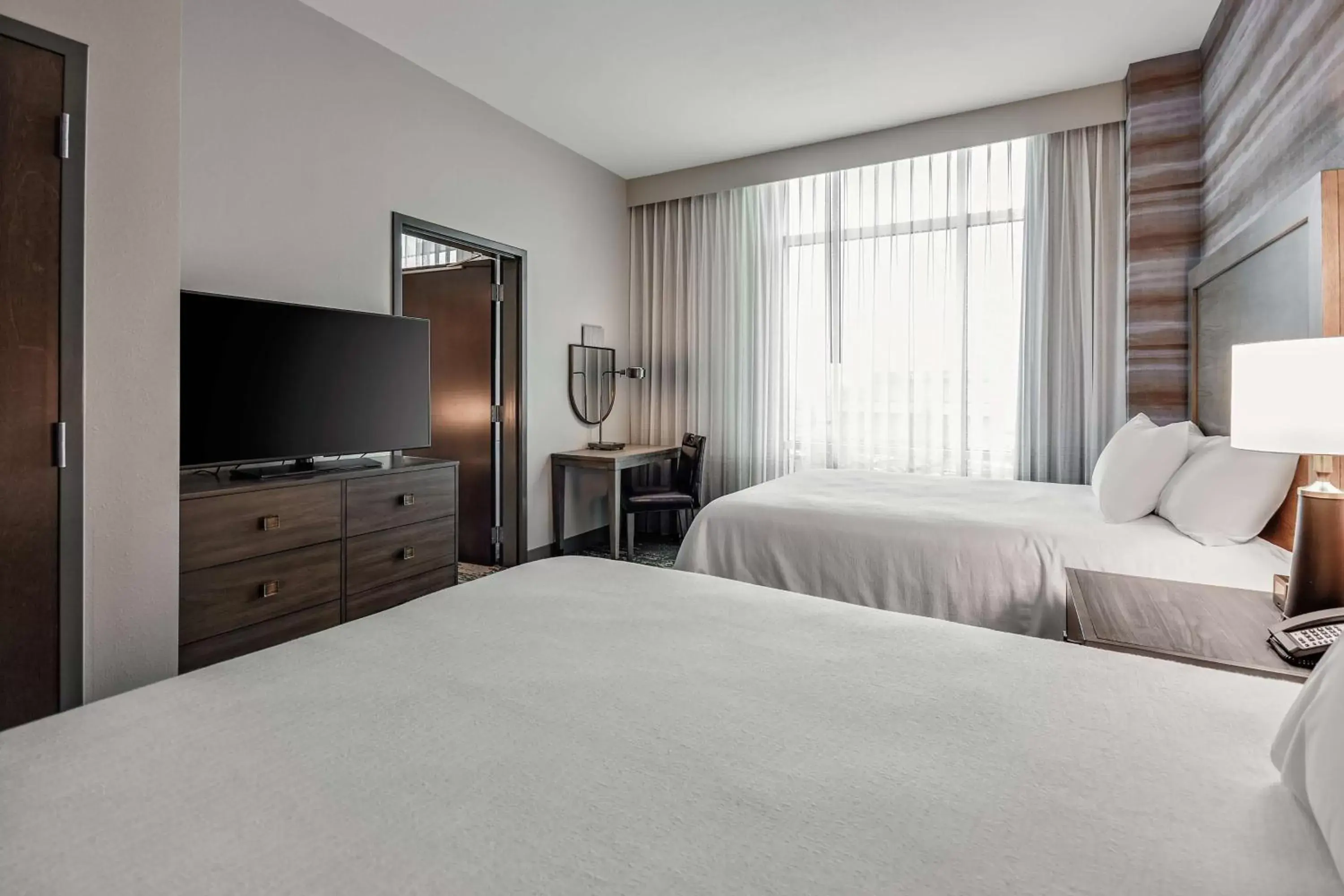 Two-Room Queen Suite with Two Queen Beds in Embassy Suites by Hilton Jonesboro Red Wolf Convention Center Two-Room Queen Suite with Two Queen Beds in Embassy Suites by Hilton Jonesboro Red Wolf Convention Center