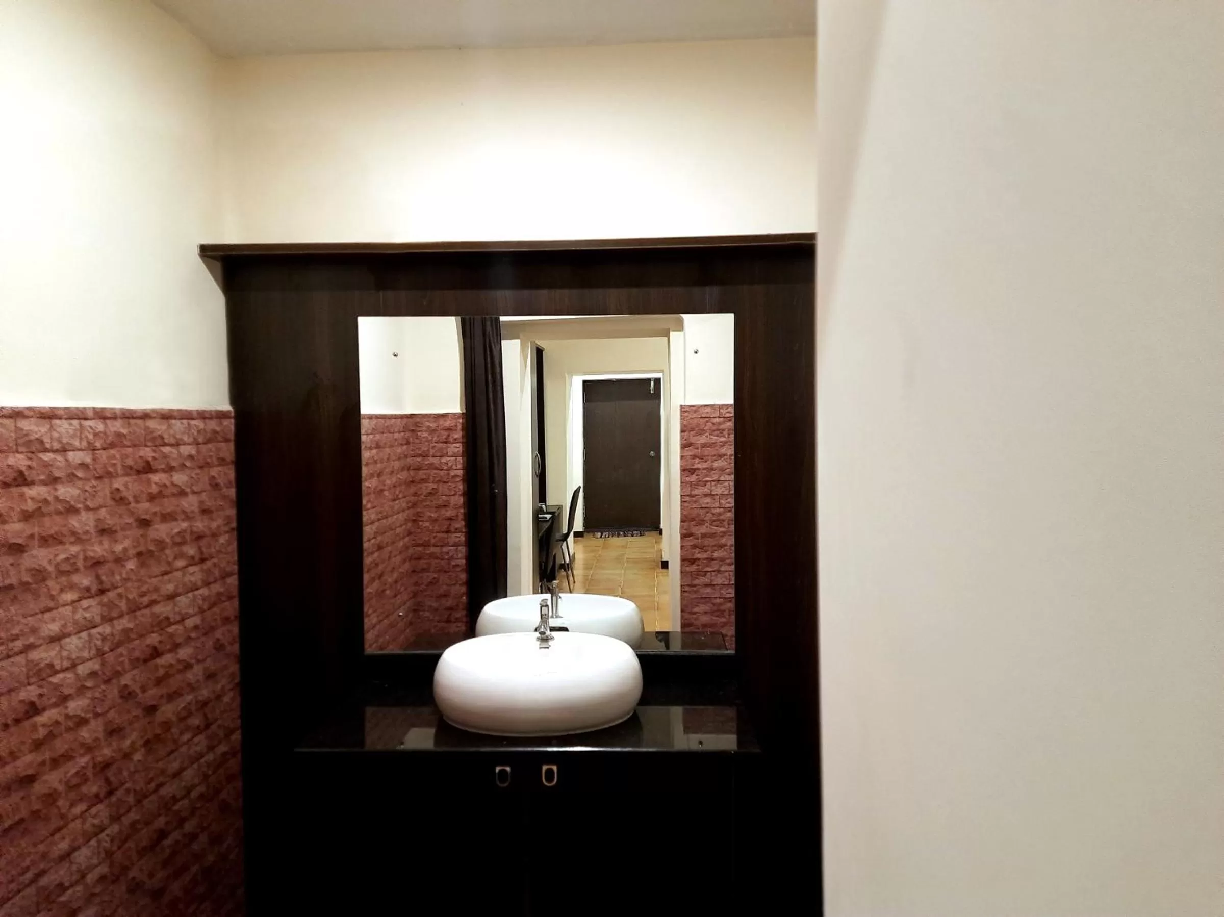 Bathroom in GRAND KODAI SR INN