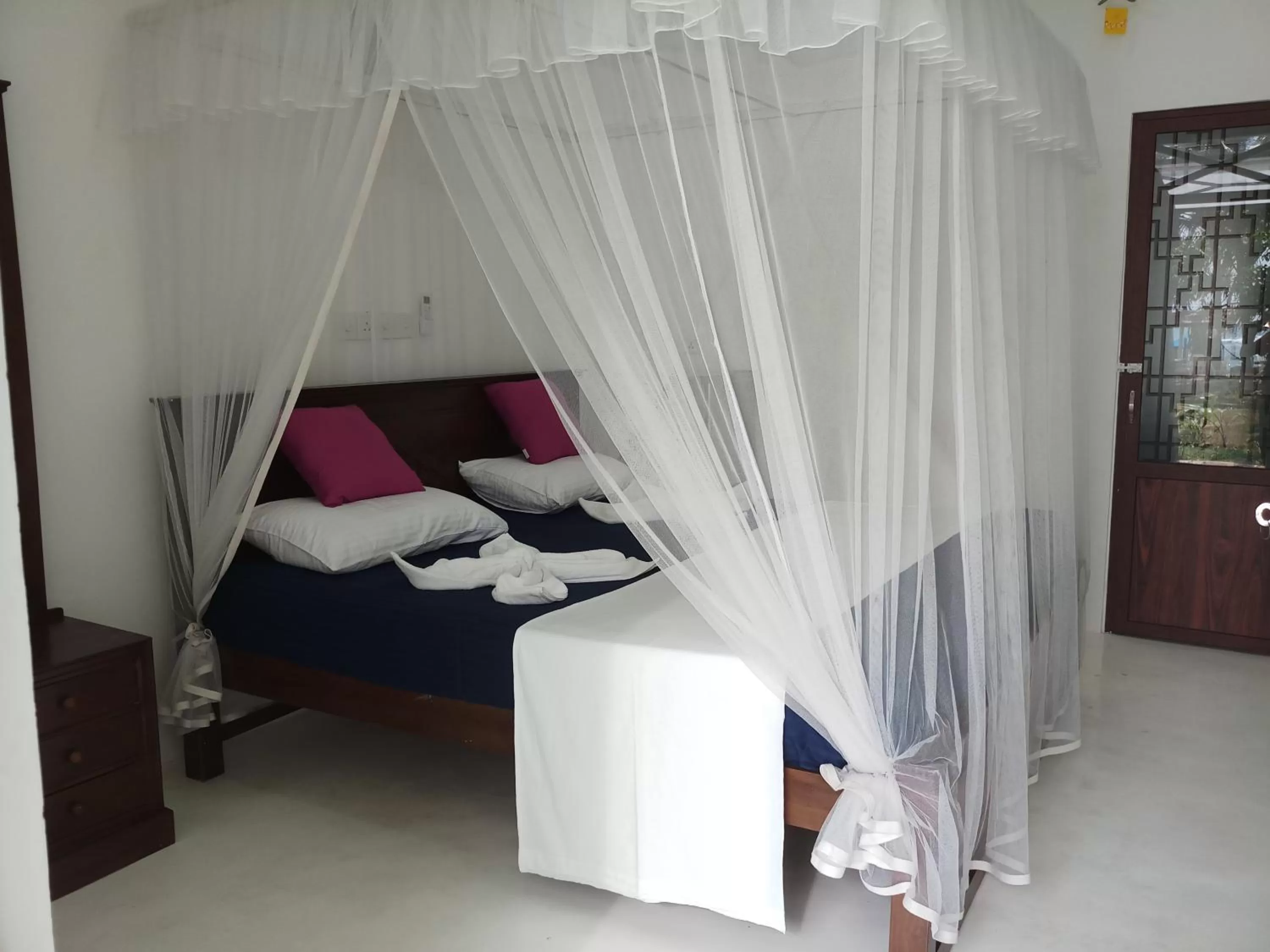 Photo of the whole room, Bed in Turtle Bay Beach Resort