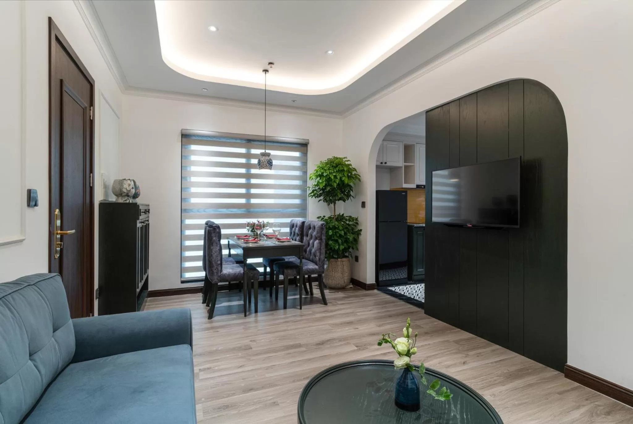 TV and multimedia, Seating Area in Paradise Suites Nguyen Khuyen