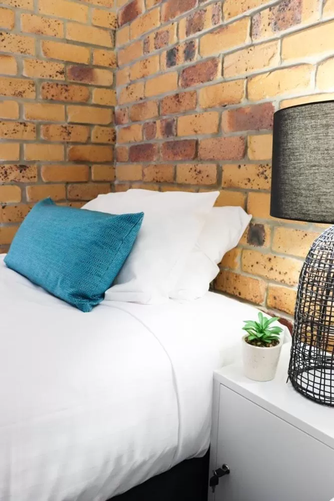 Bed in Kennedy Drive Boutique Motel - Close To City Centre & Airport