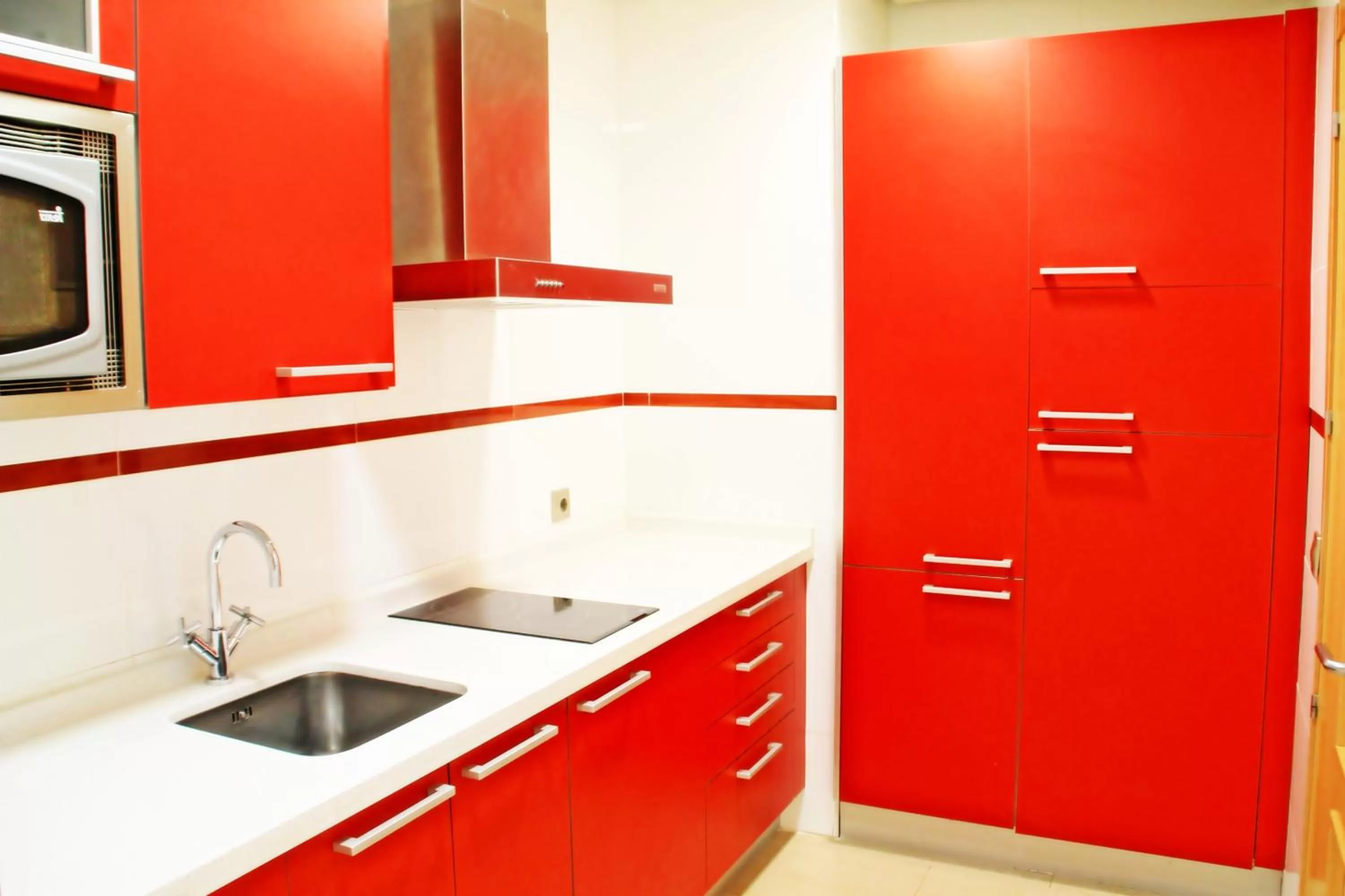 Kitchen or kitchenette in Apartahotel Ribera