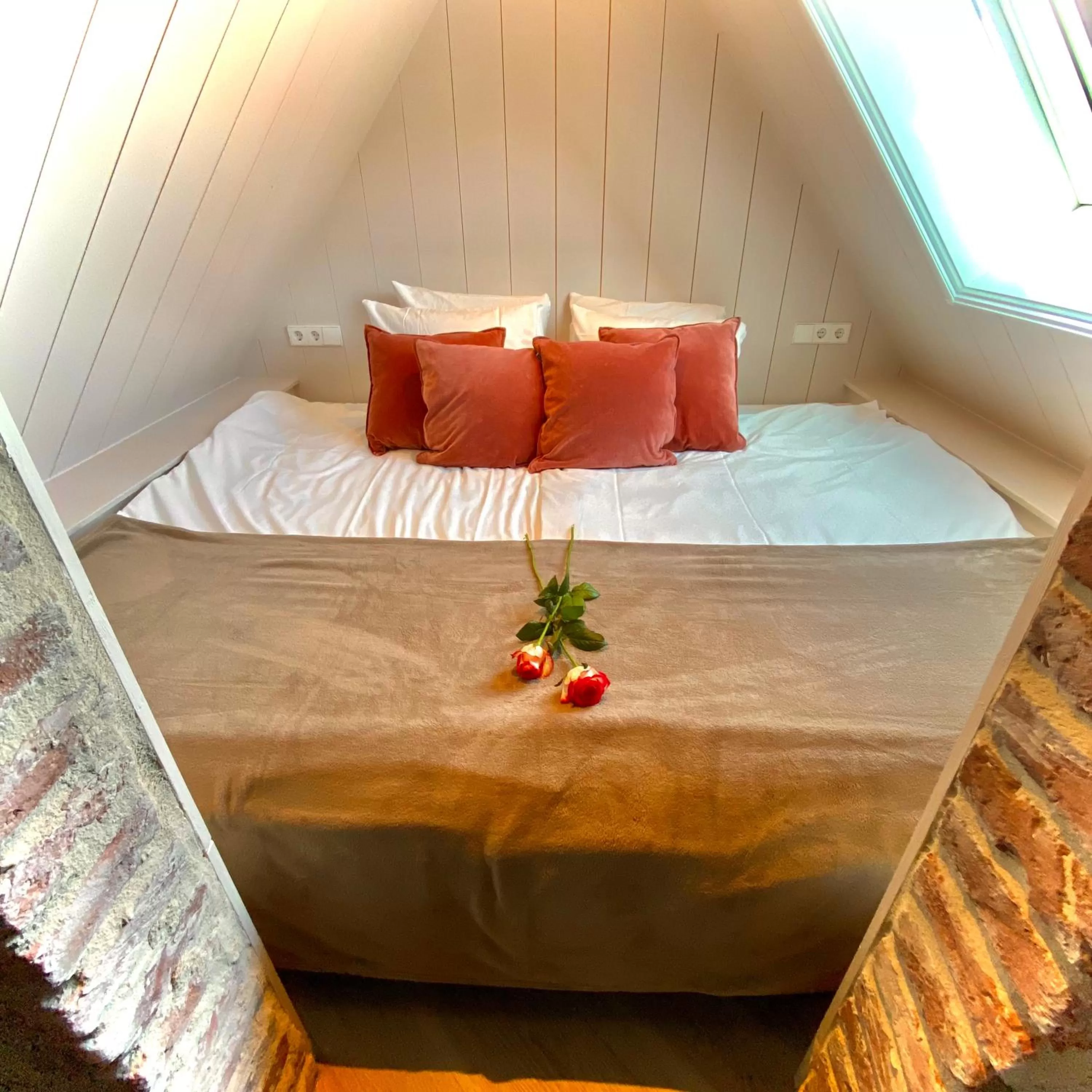 Bed in Harbour Suites Boutique Hotel