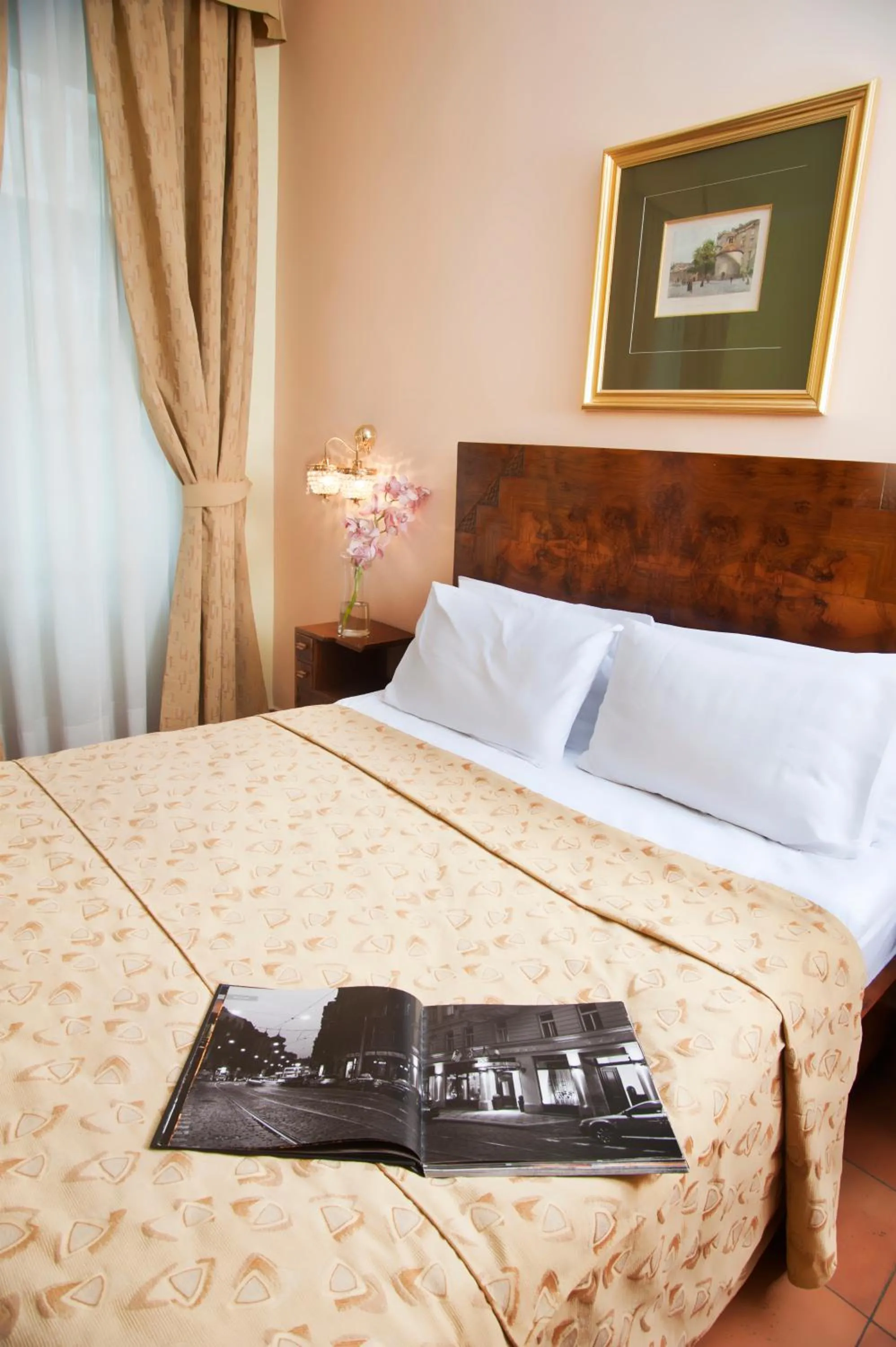 Bed in Hotel Caesar Prague