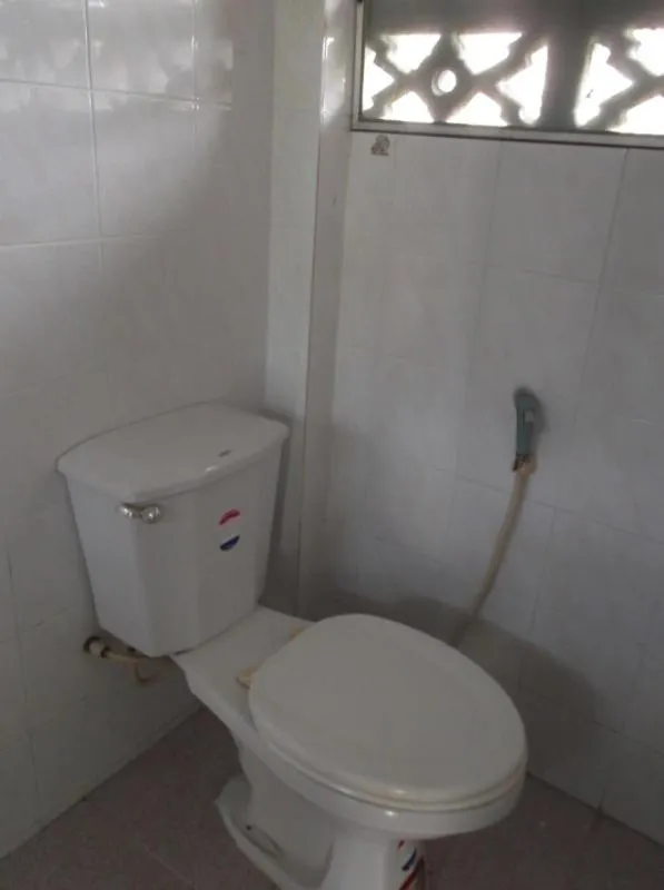 Toilet in Palm Point Village