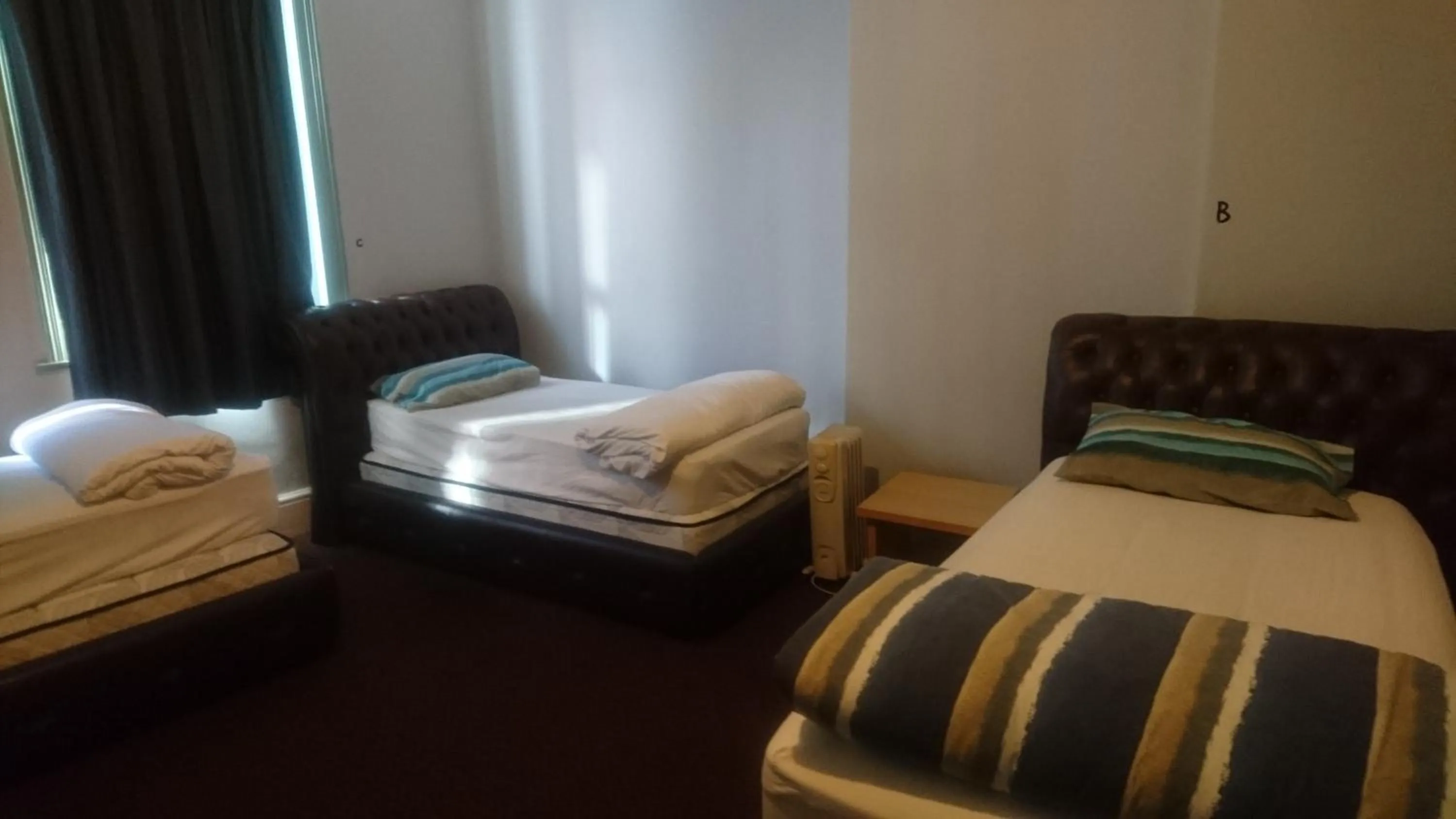 Bed in Backpackers Imperial Hotel