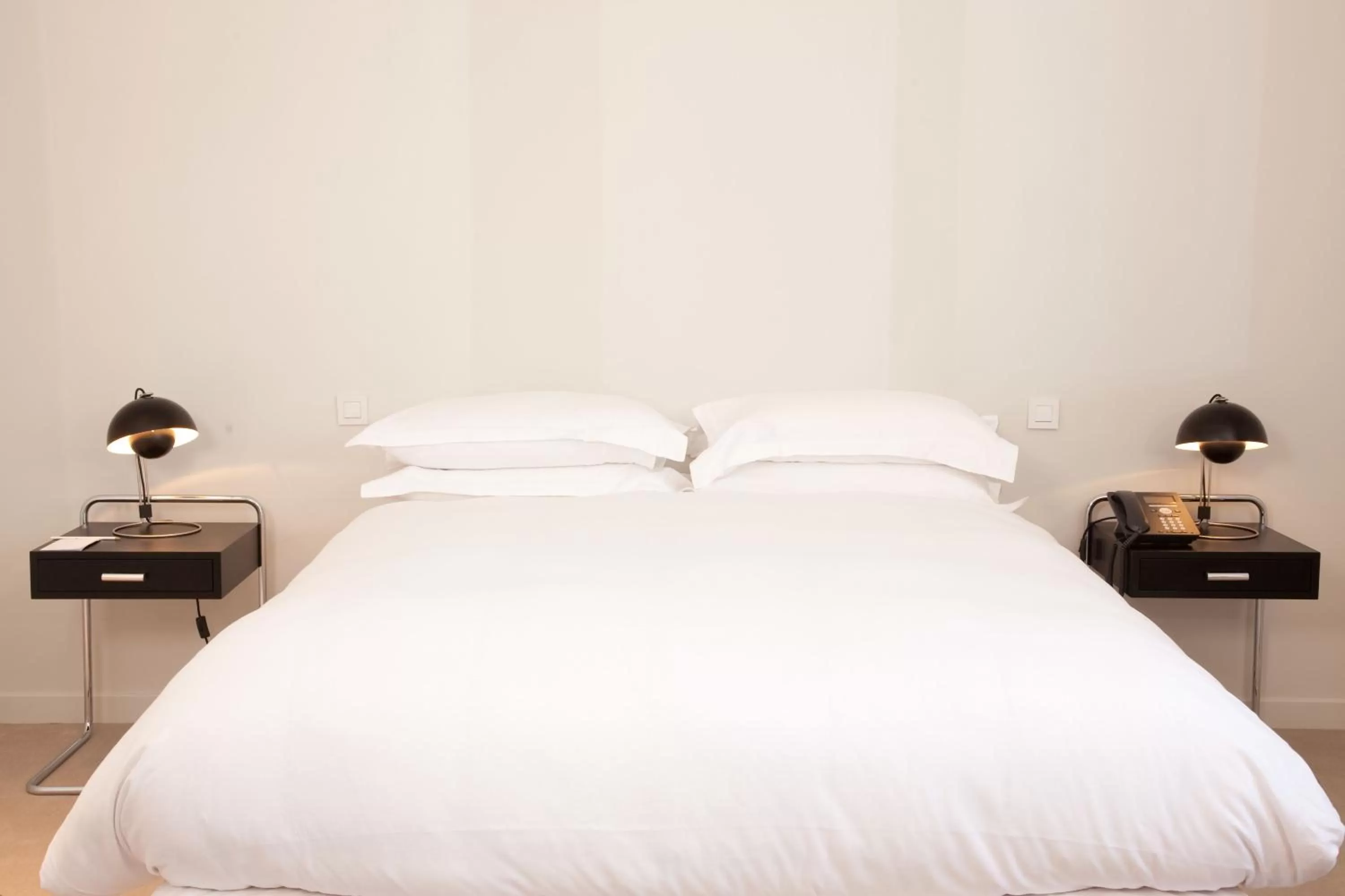 Bed in La Maison Champs Elysées