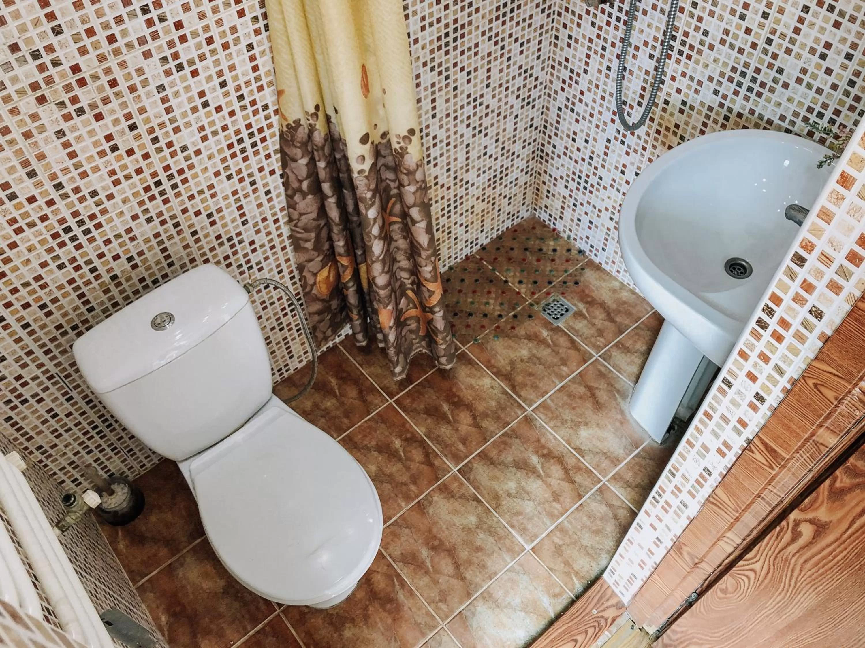 Bathroom in Zolotoy Bereg Hotel