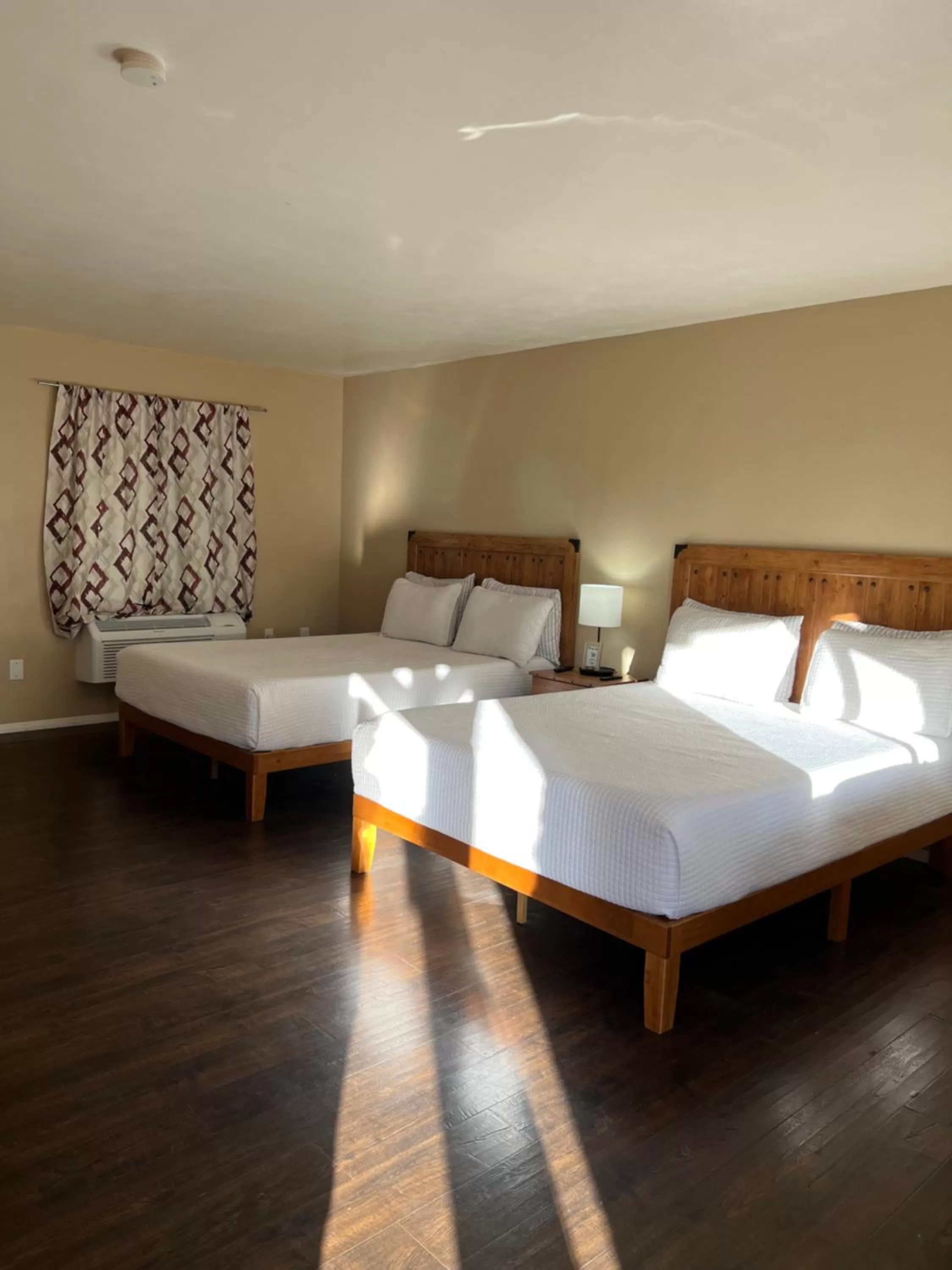 Bed in TimberLodge Inn