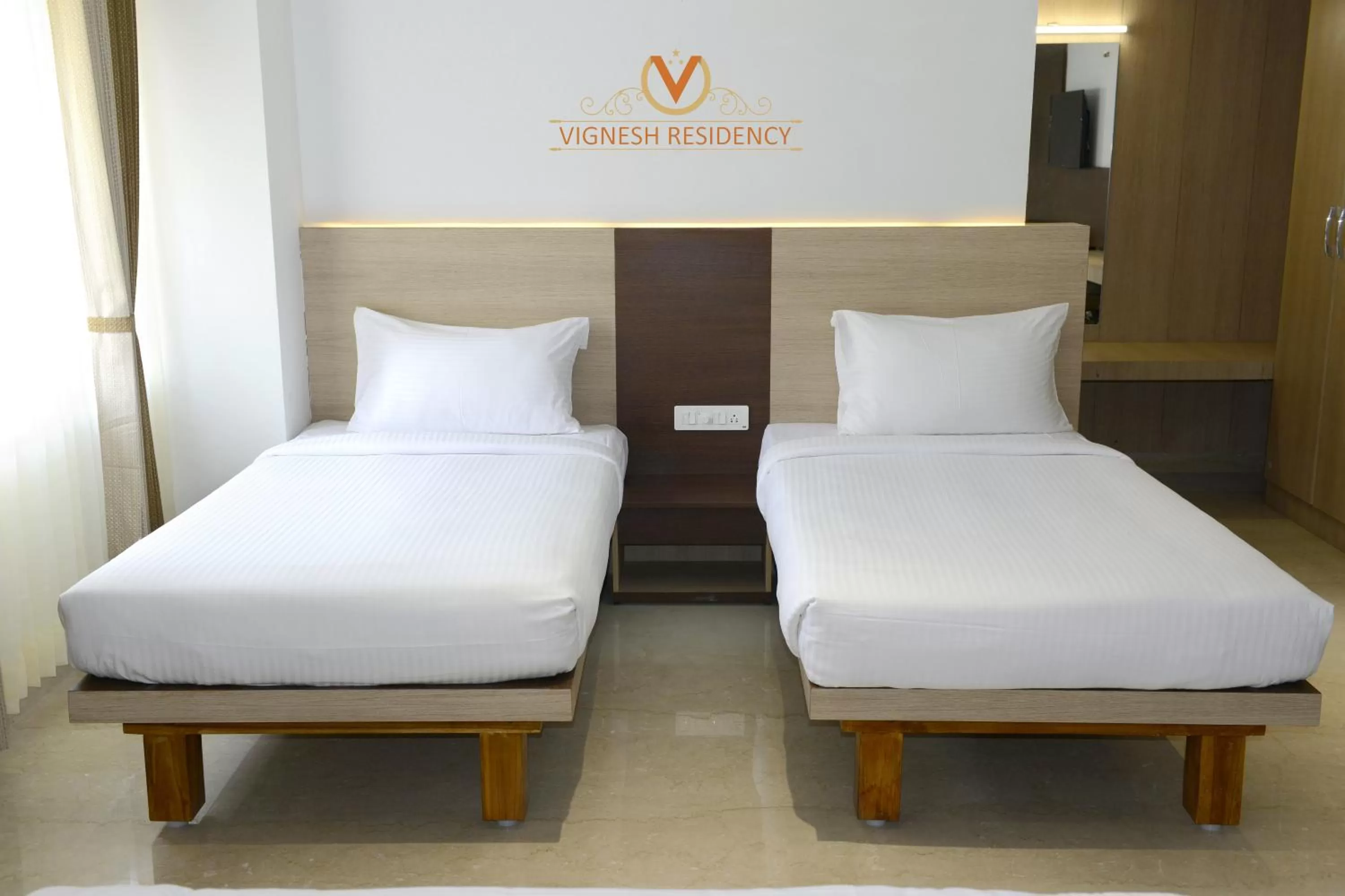 Bed in Vignesh Residency