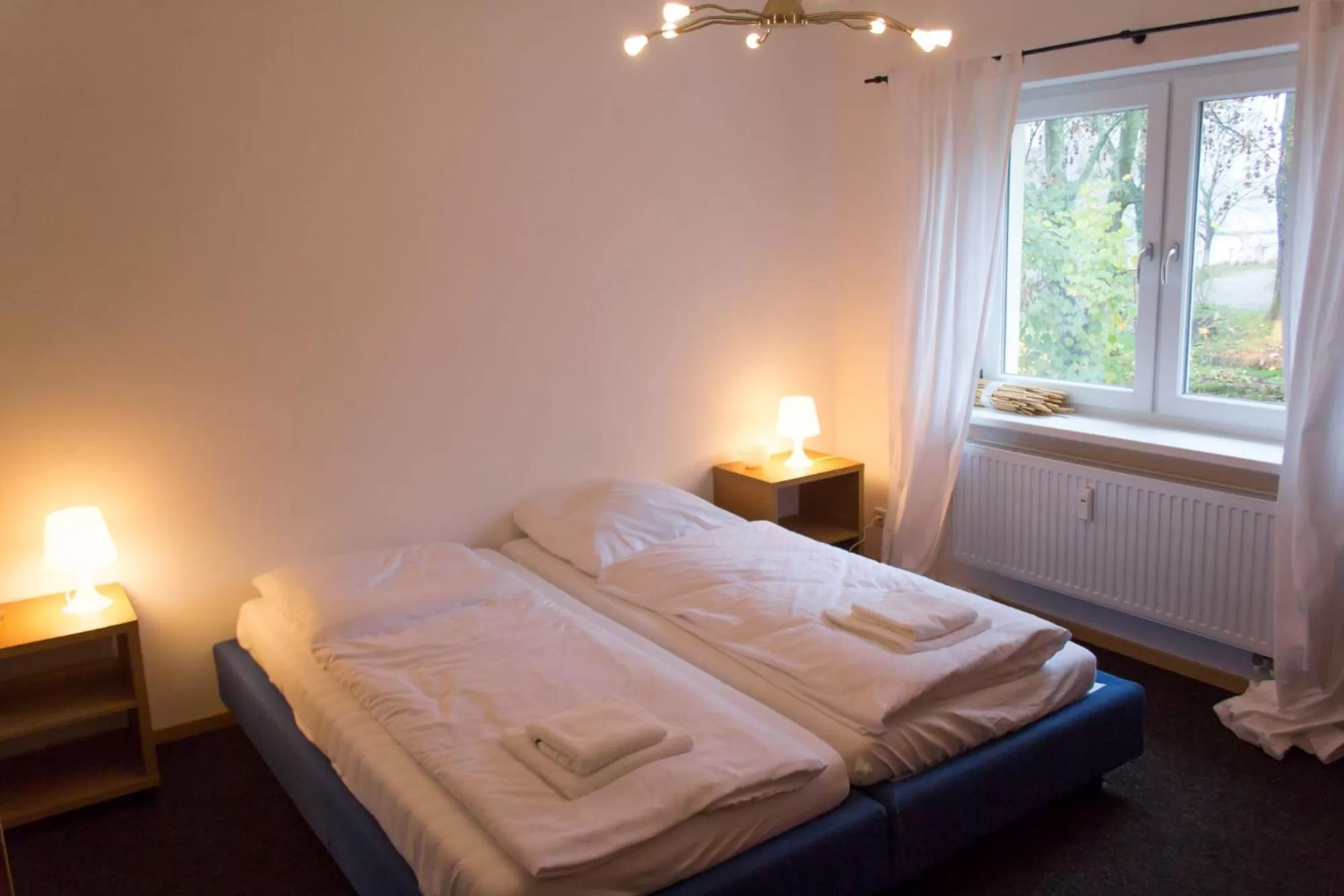 Bed in Gästehaus Schloss Plaue